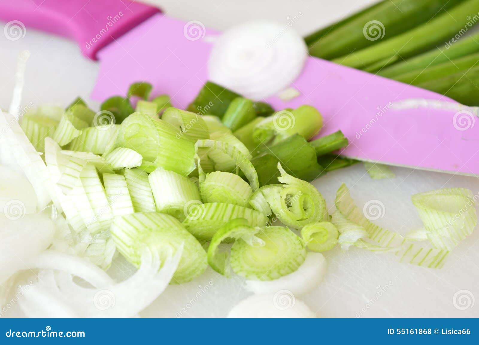 Green onions and knife stock photo. Image of purple, green 55161868