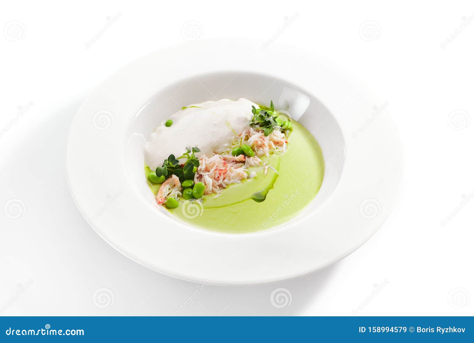 green pea soup with crab and coconut espuma