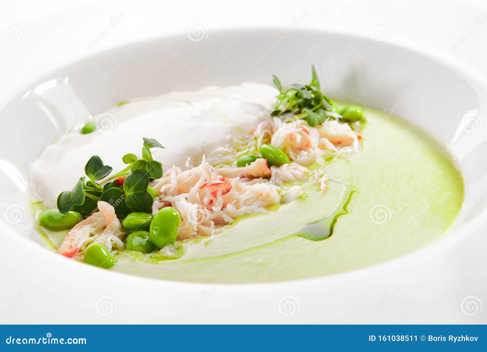 green pea soup with crab and coconut espuma