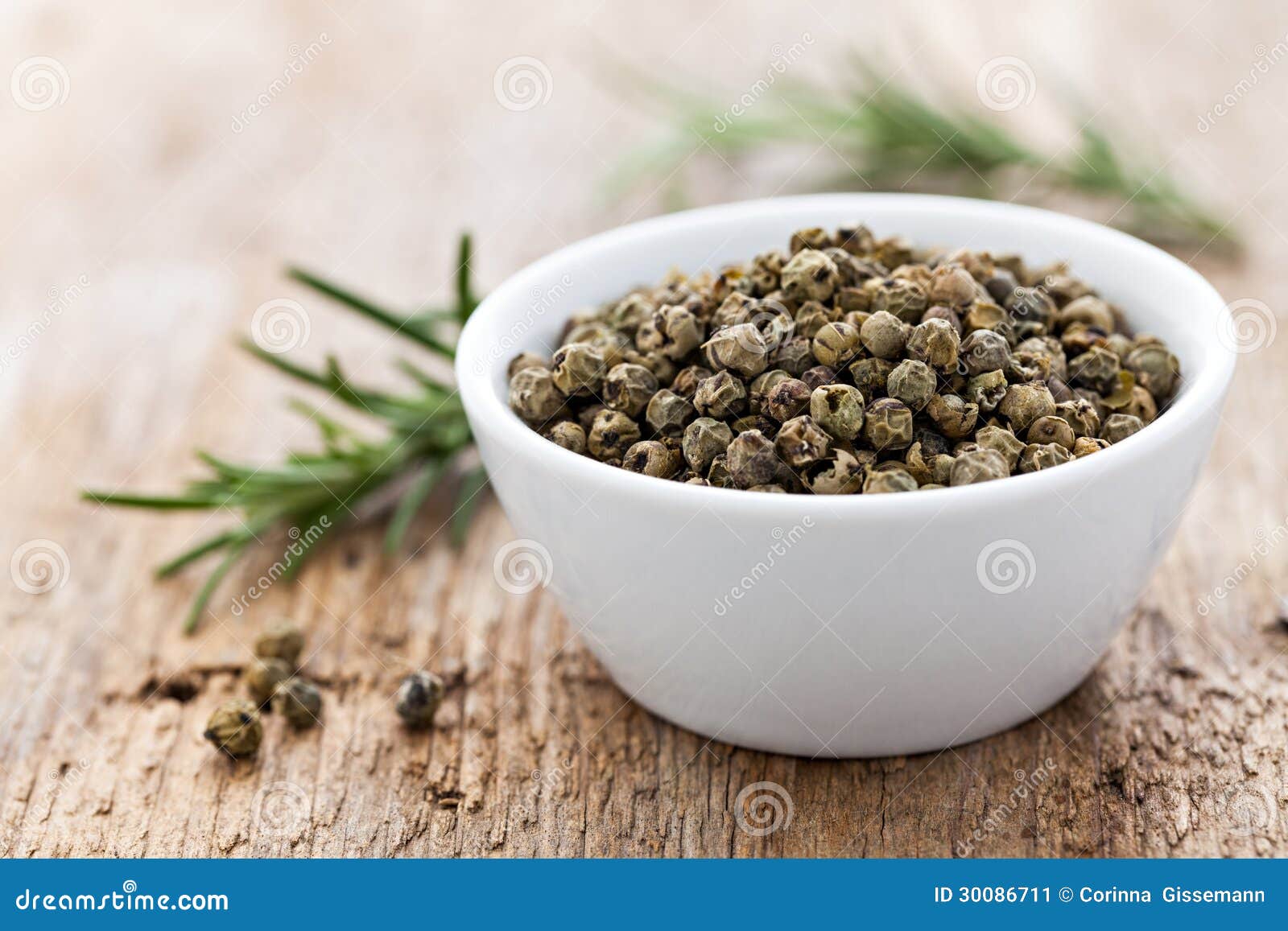 Green Peppercorns Or Schinus Terebinthifolius. Isolated On White