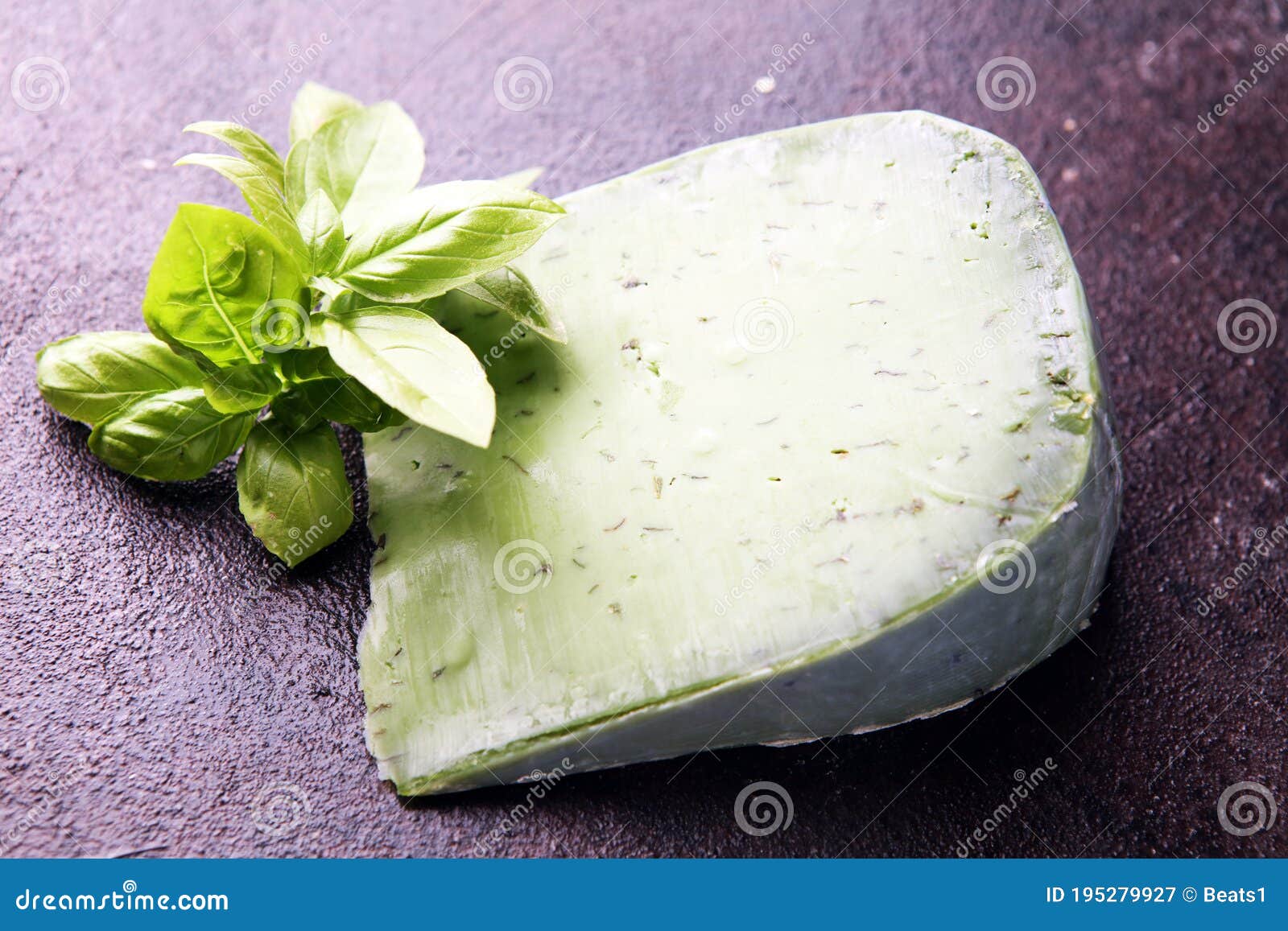 Green Pesto Cheese and Basil Leaves on Dark Rustic Table Stock Image
