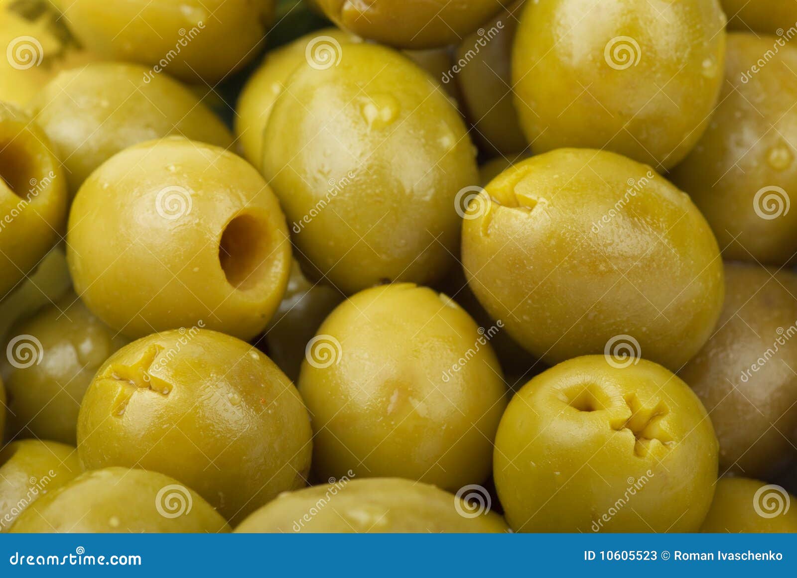 Green pitted olives stock image. Image of conserved, pile 10605523