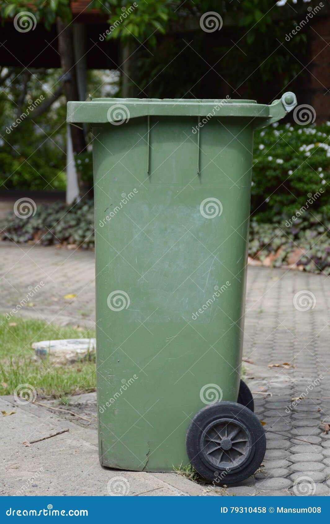 Green plastic bin stock photo. Image of park, garden 79310458