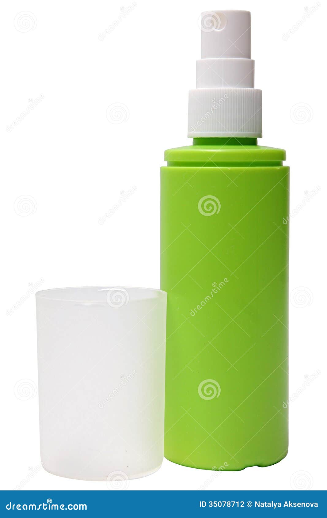 green plastic bottle of spray  on a white