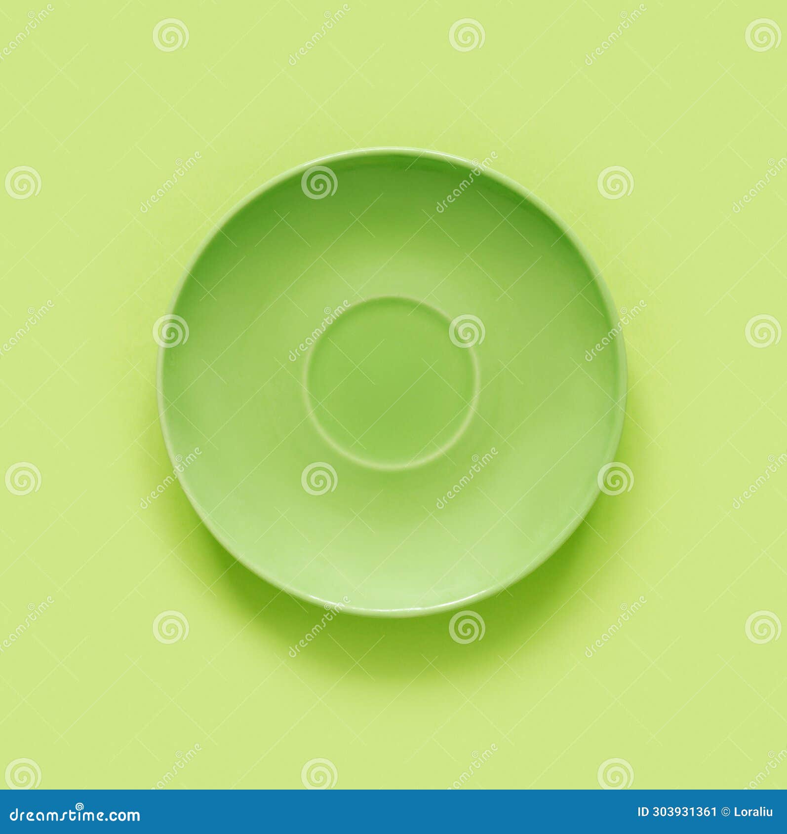 Green Plates on Green Table. Monochrome Minimalistic Image in Hipster