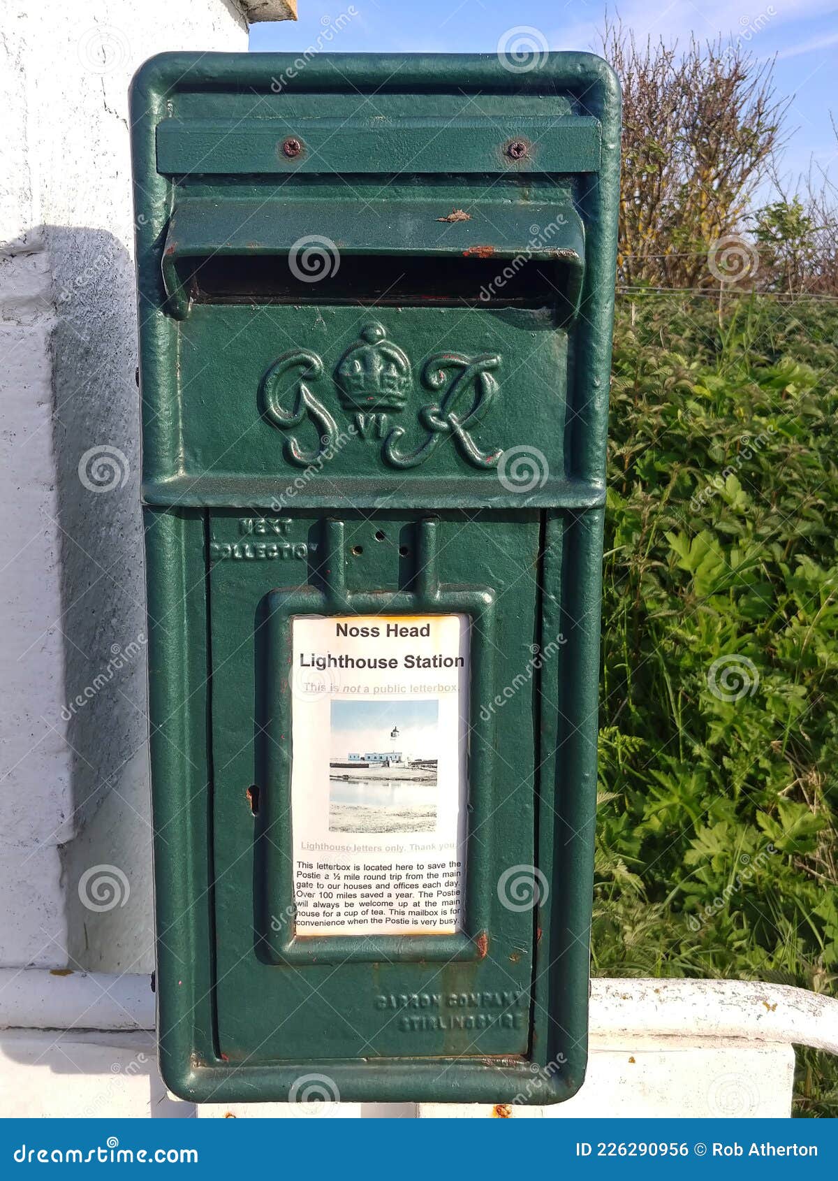 a green post box from the reign of king george vi in scotland