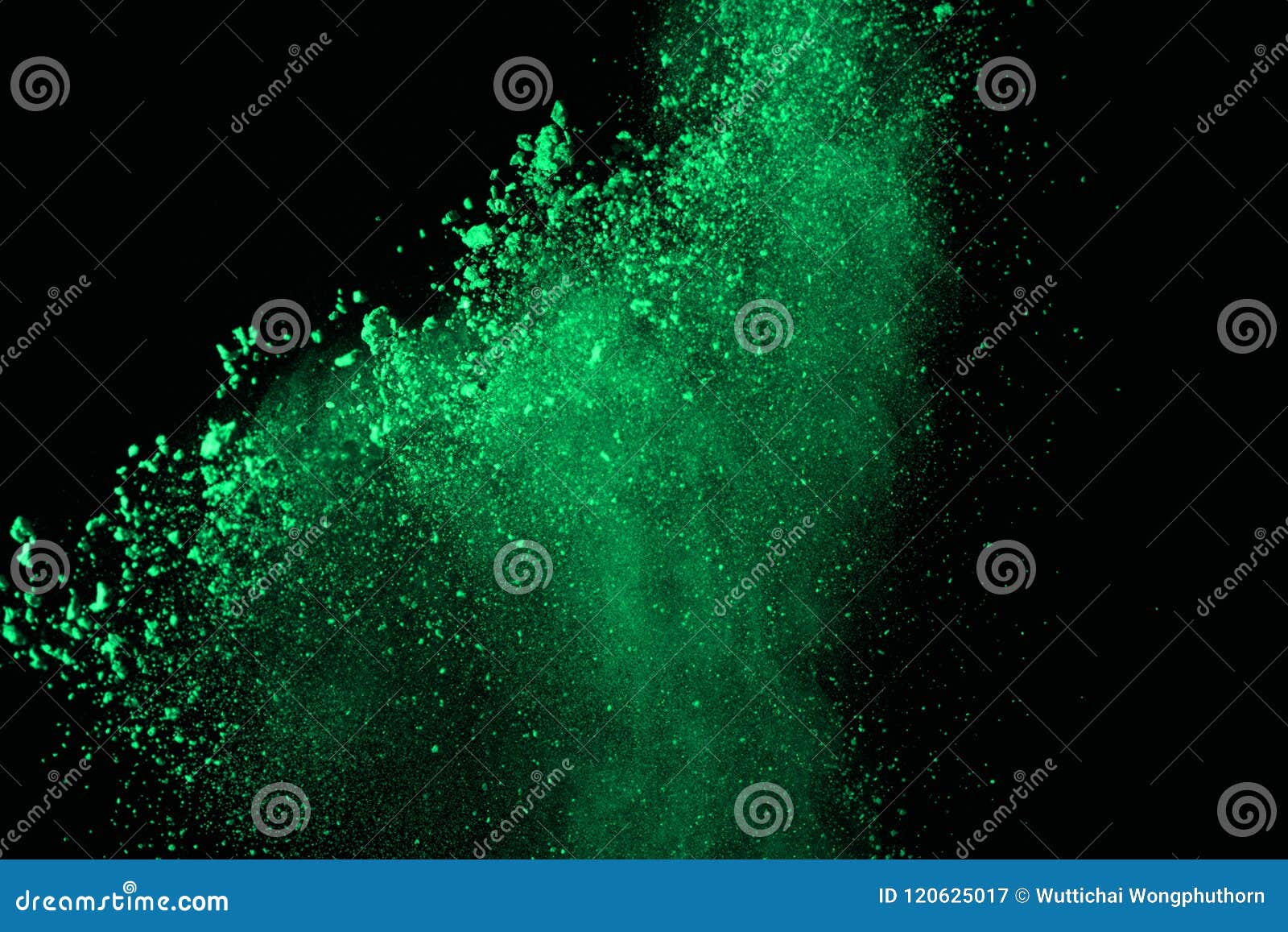 Green Powder Explosion on Black Background.Green Dust Explosive Stock
