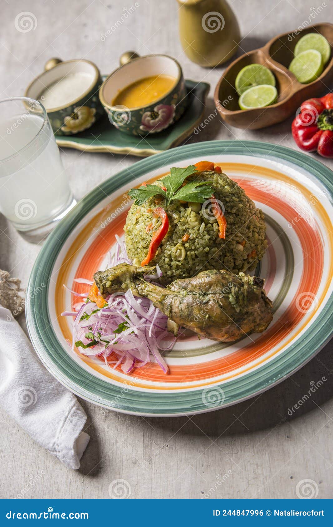 green rice with chicken leg and onion sauce arroz con pollo y zarza de cebolla peruvian comfort food buffet traditional table