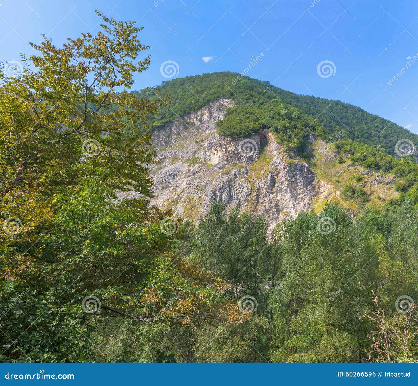 Green rocky mountain stock photo. Image of rock, green 60266596