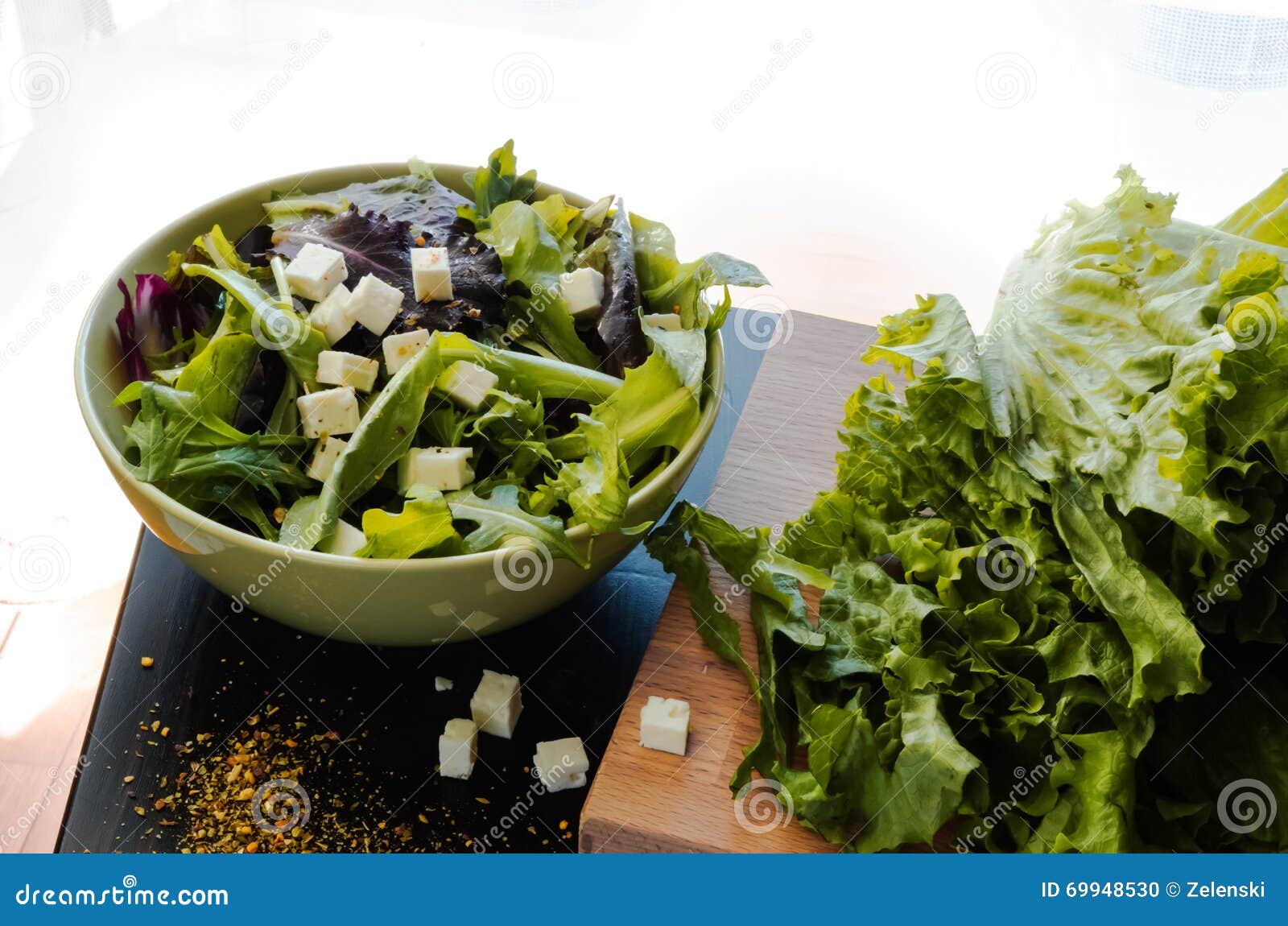 Green salad in the bowl stock photo. Image of board, bowl 69948530