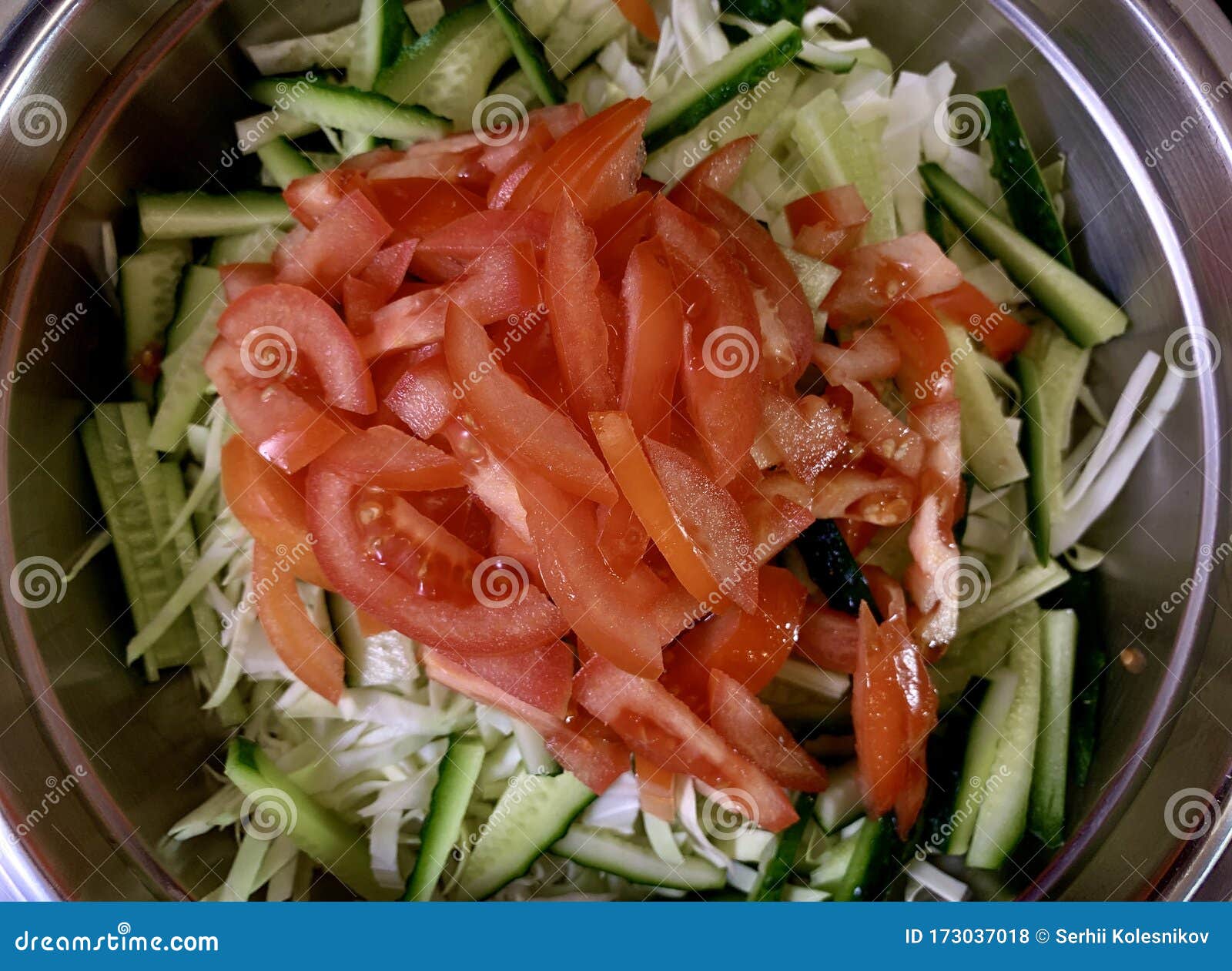 Green Salad Of Cabbage, Cucumbers And Tomatoes, On A Black ...