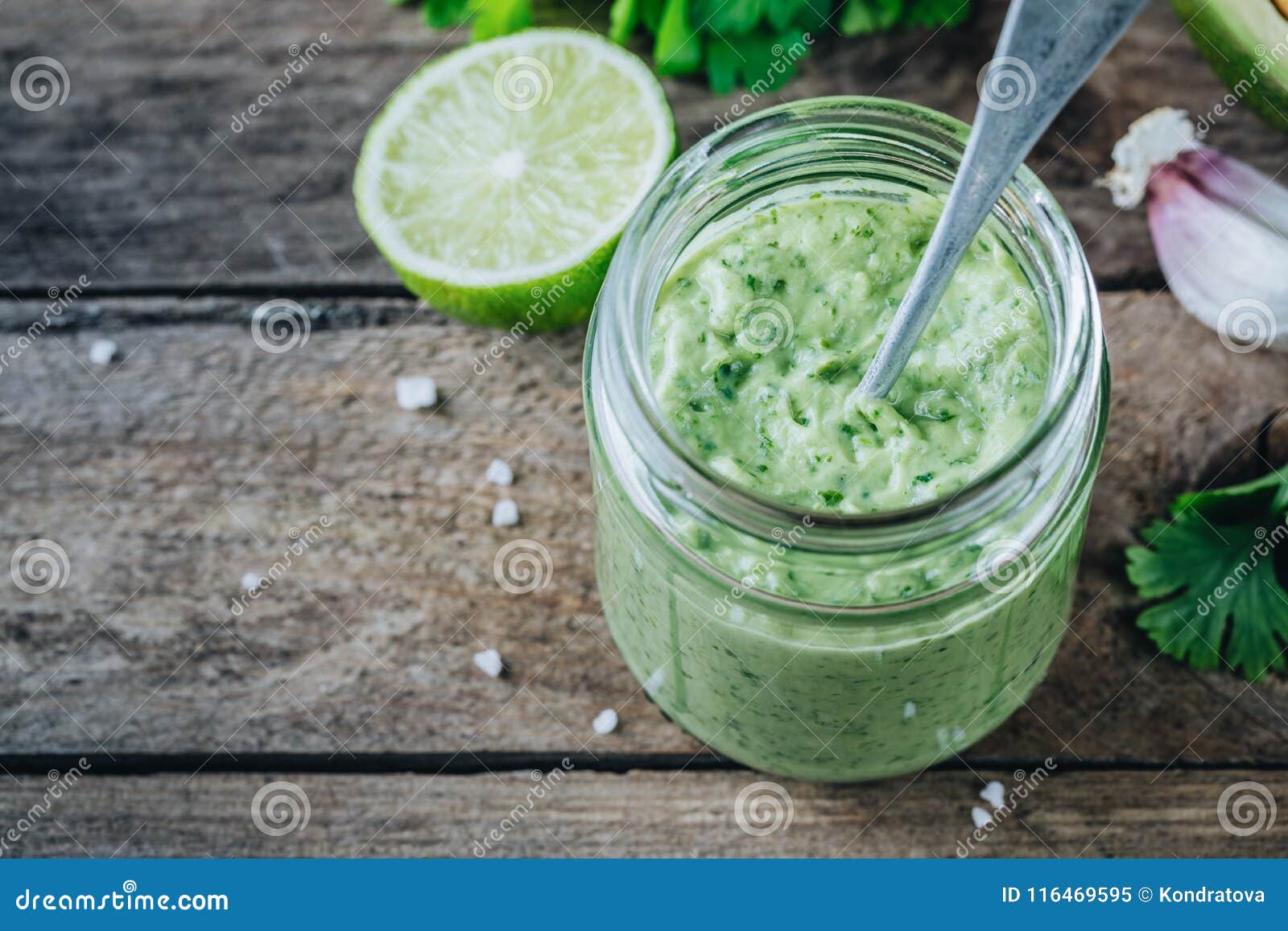 Green Salad Dressing with Avocado, Lime and Cilantro in a Glass Jar ...