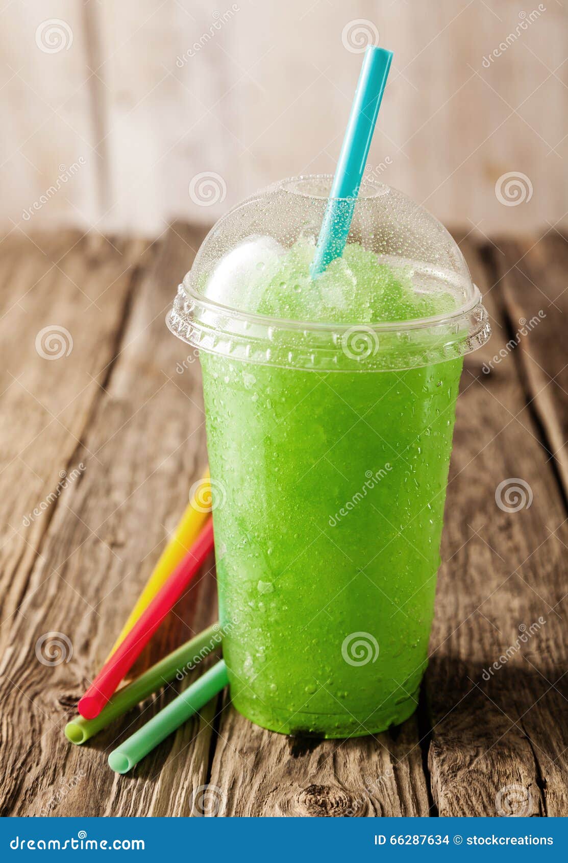 Green Slushie Drink in Plastic Cup with Straws Stock Photo - Image of ...