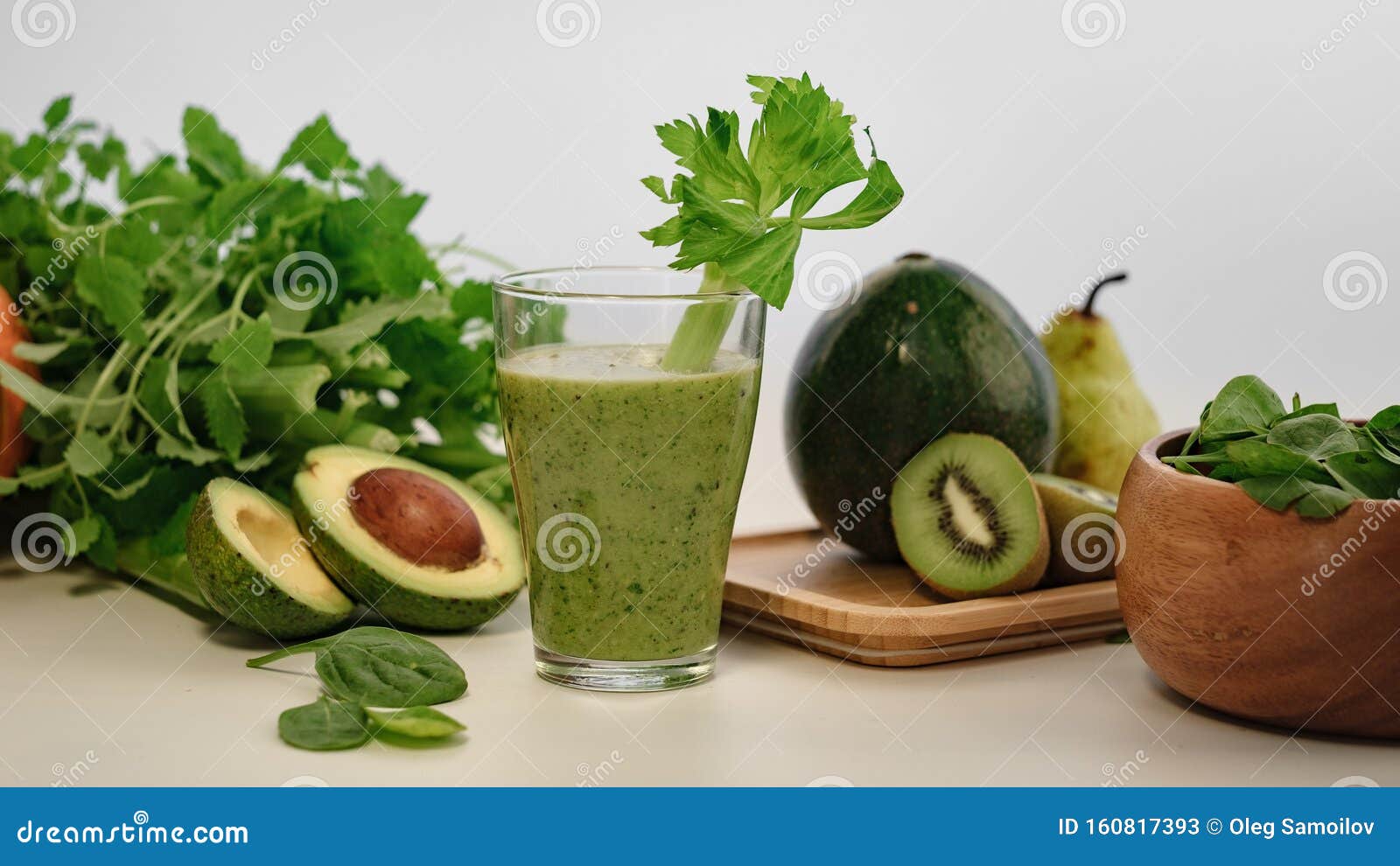 Green Smoothie with a Stalk of Celery in a Glass Cup. on the Table is an  Avocado. Stock Image - Image of kiwi, celery: 160817393
