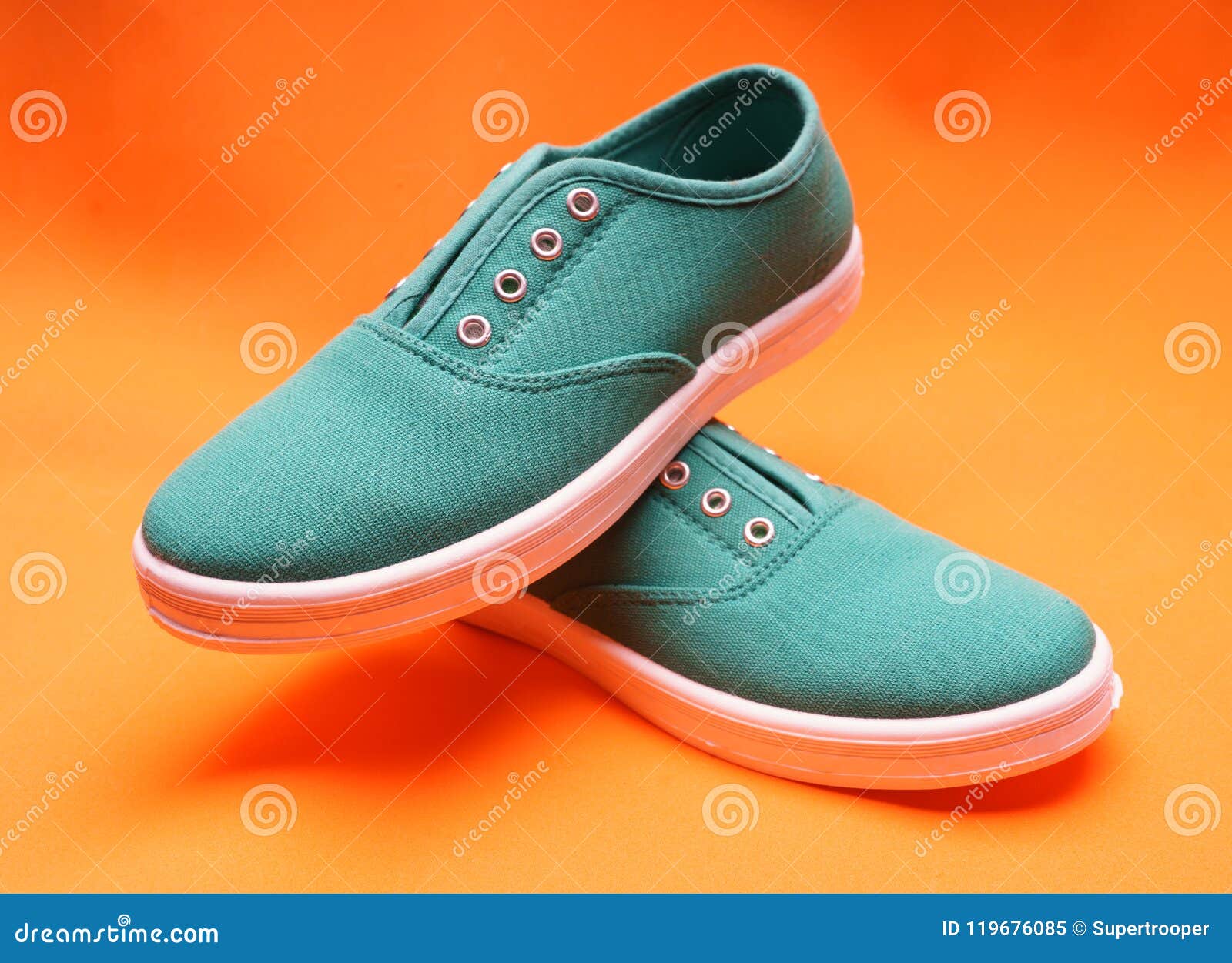 Green Sneakers on Orange stock image. Image of minimalist - 119676085