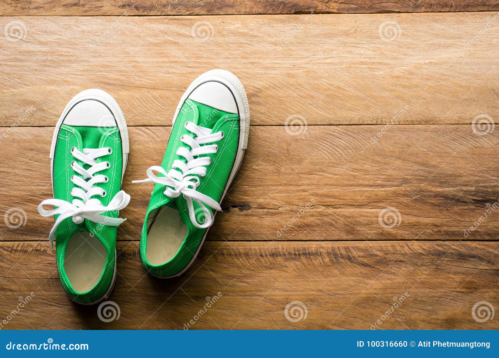 Green Sneakers on Wooden Floors.-lifestyle Stock Photo - Image of ...