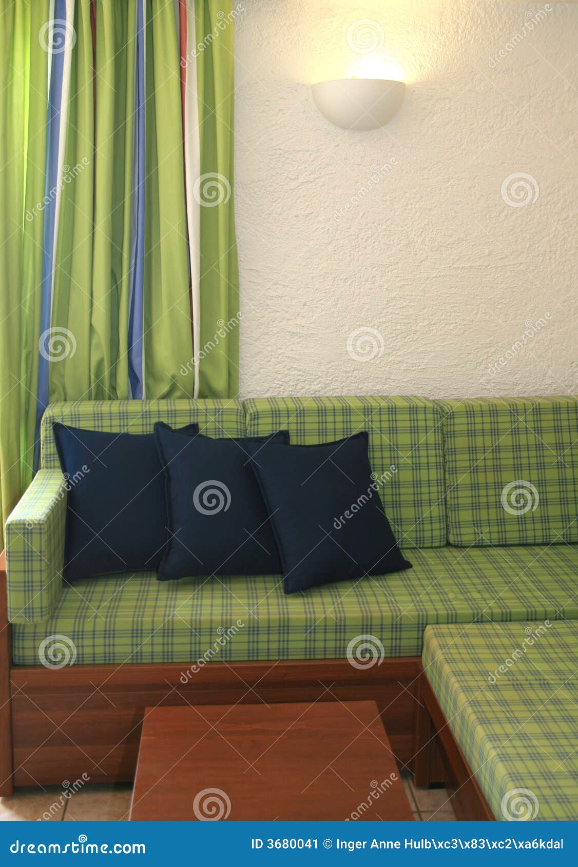 Green sofa and curtain stock image. Image of decorating 3680041