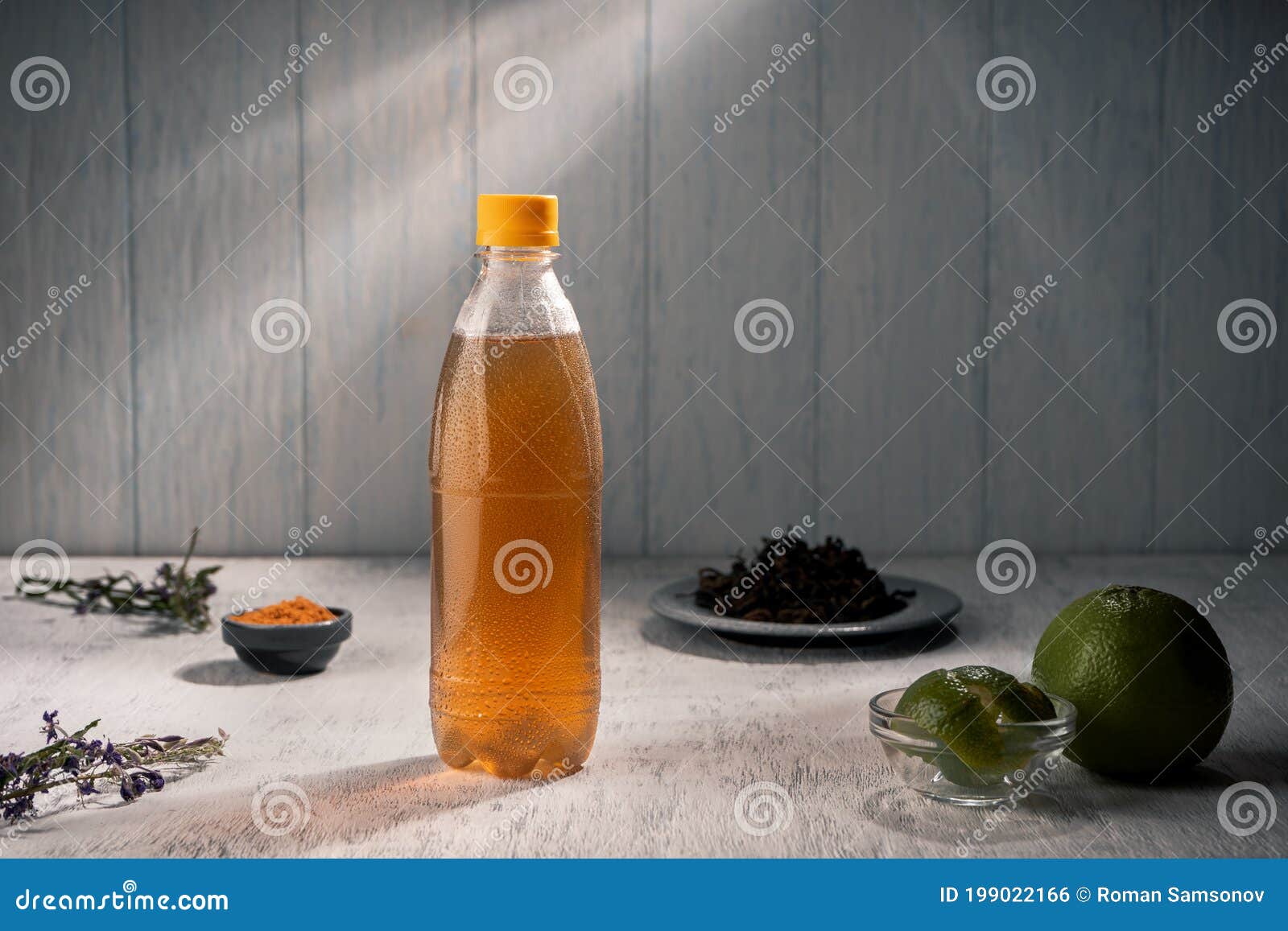 Green Tea with Green Mandarin Oil in a Plastic Bottle Stock Photo