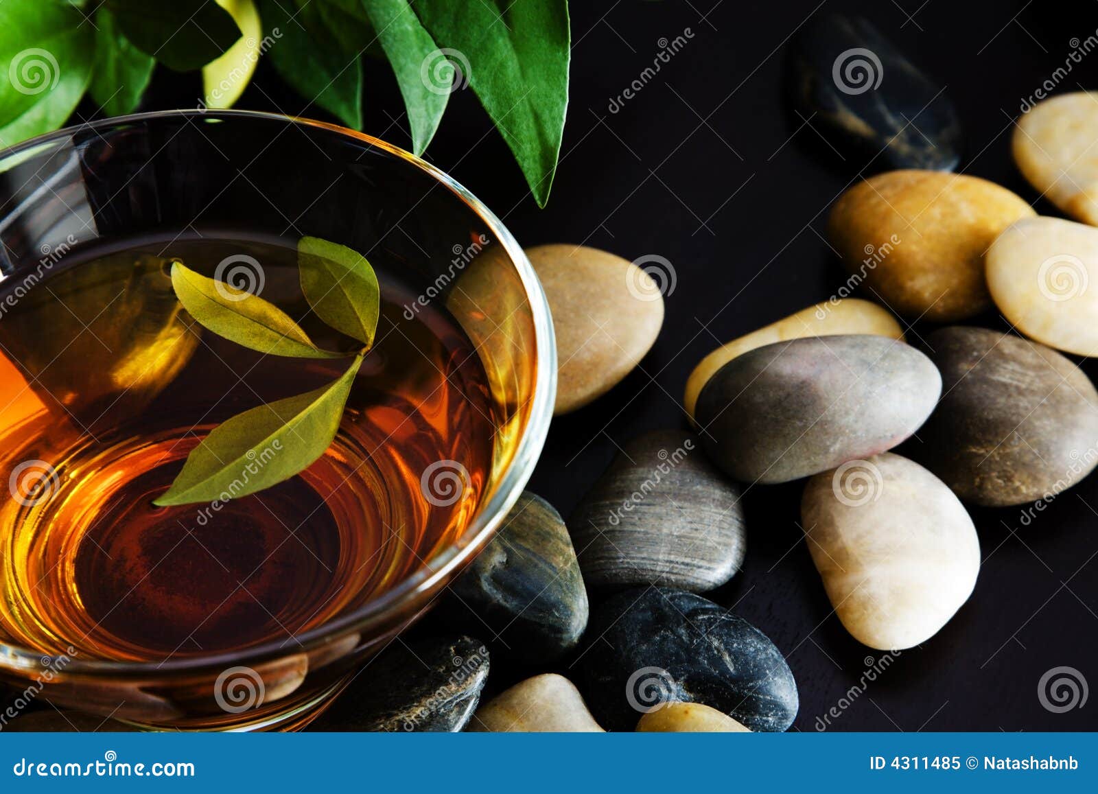 Green tea and pebbles stock image. Image of herbal, culture 4311485
