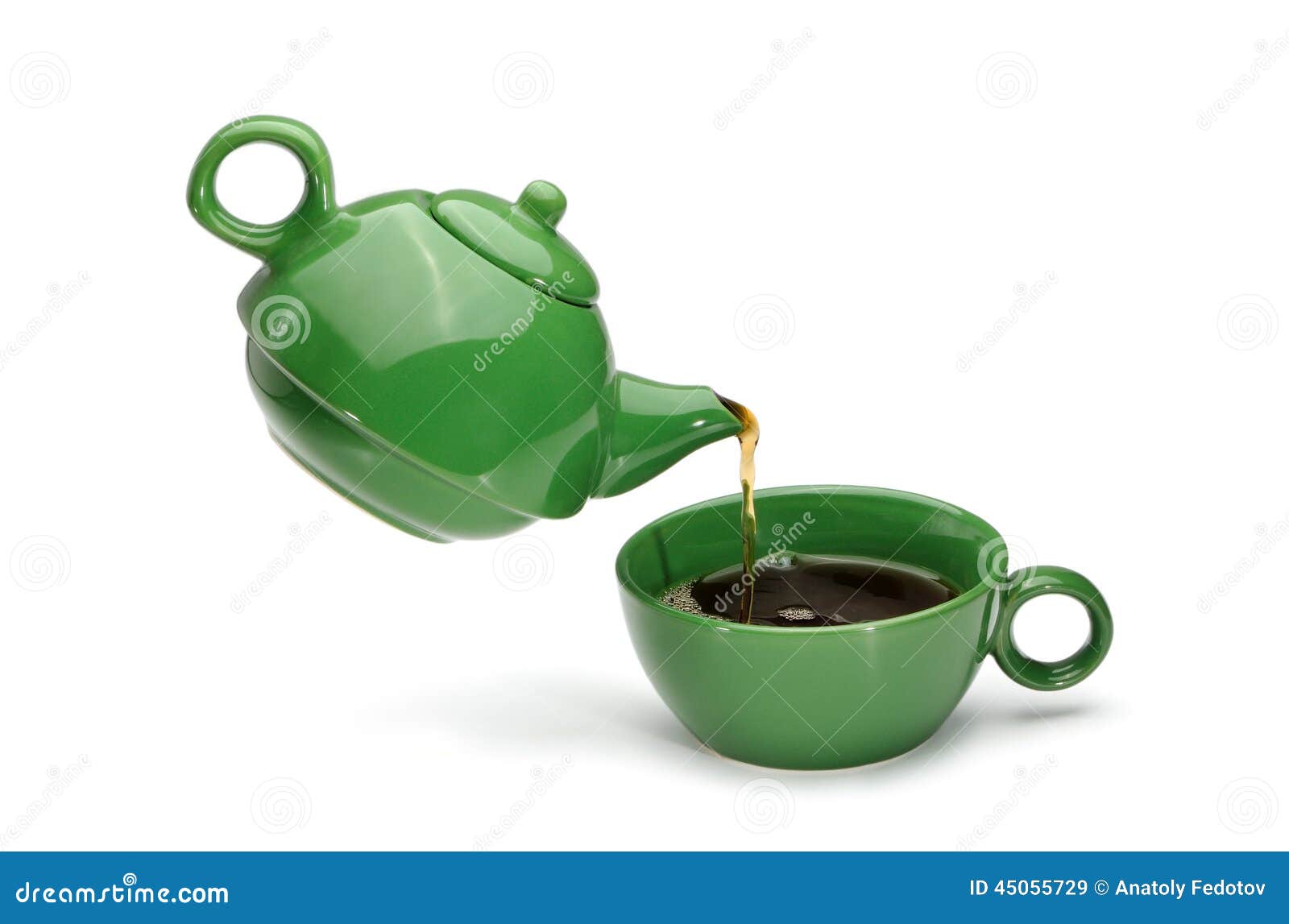 Green Teapot Pouring Tea into a Green Cup Stock Image Image of volume