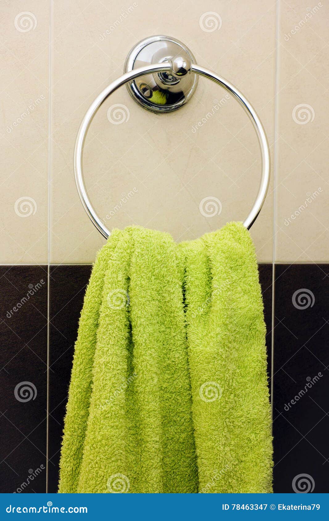 Green Towel Hanging on Towel Ring Stock Image Image of tile, ring