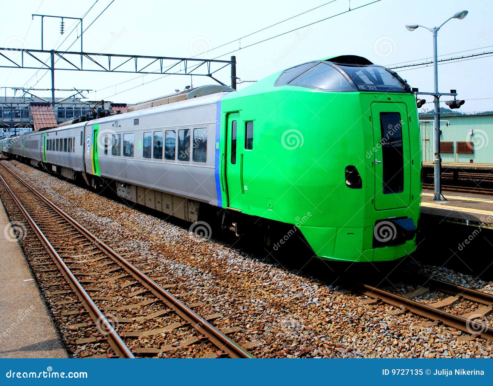 Green train in Japan stock image. Image of green, rail 9727135