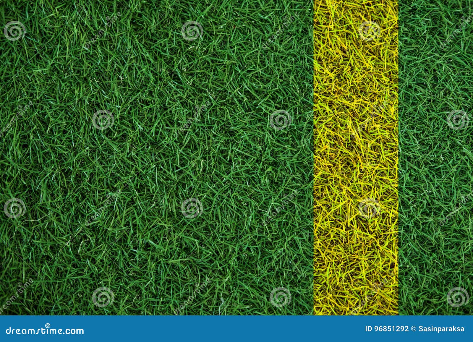 Green Turf Grass Texture with Yellow Line, in Soccer Field Stock Photo