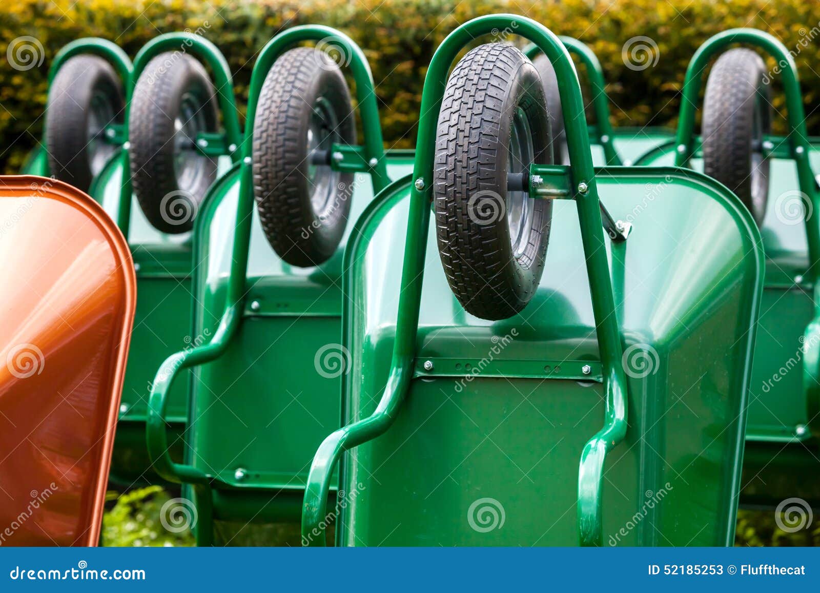 Green wheelbarrows stock image. Image of pack, ground 52185253