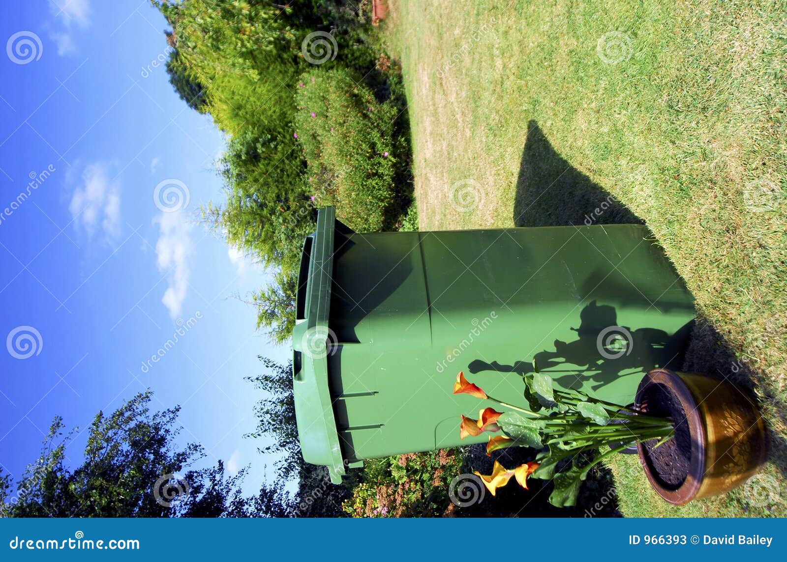 Green Wheely Bin stock image. Image of flowers, bush, grass 966393