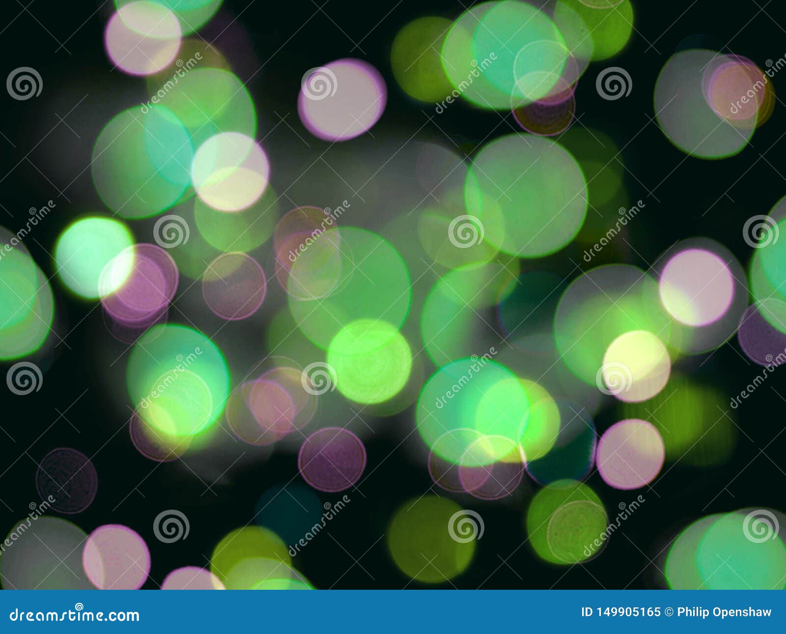 Green and White Round Glowing Bright Light Abstract Lights on a Black