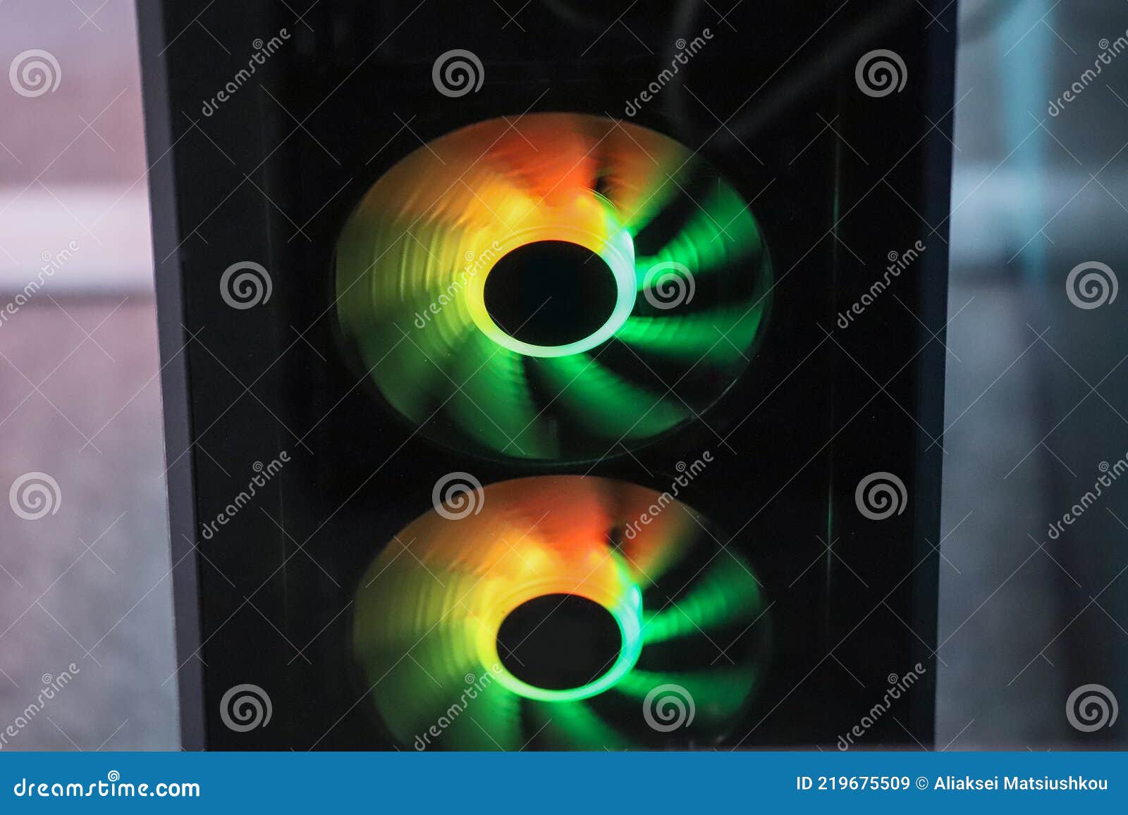 Green, Green and Yellow Illumination of the Cooler. Computer Fan with