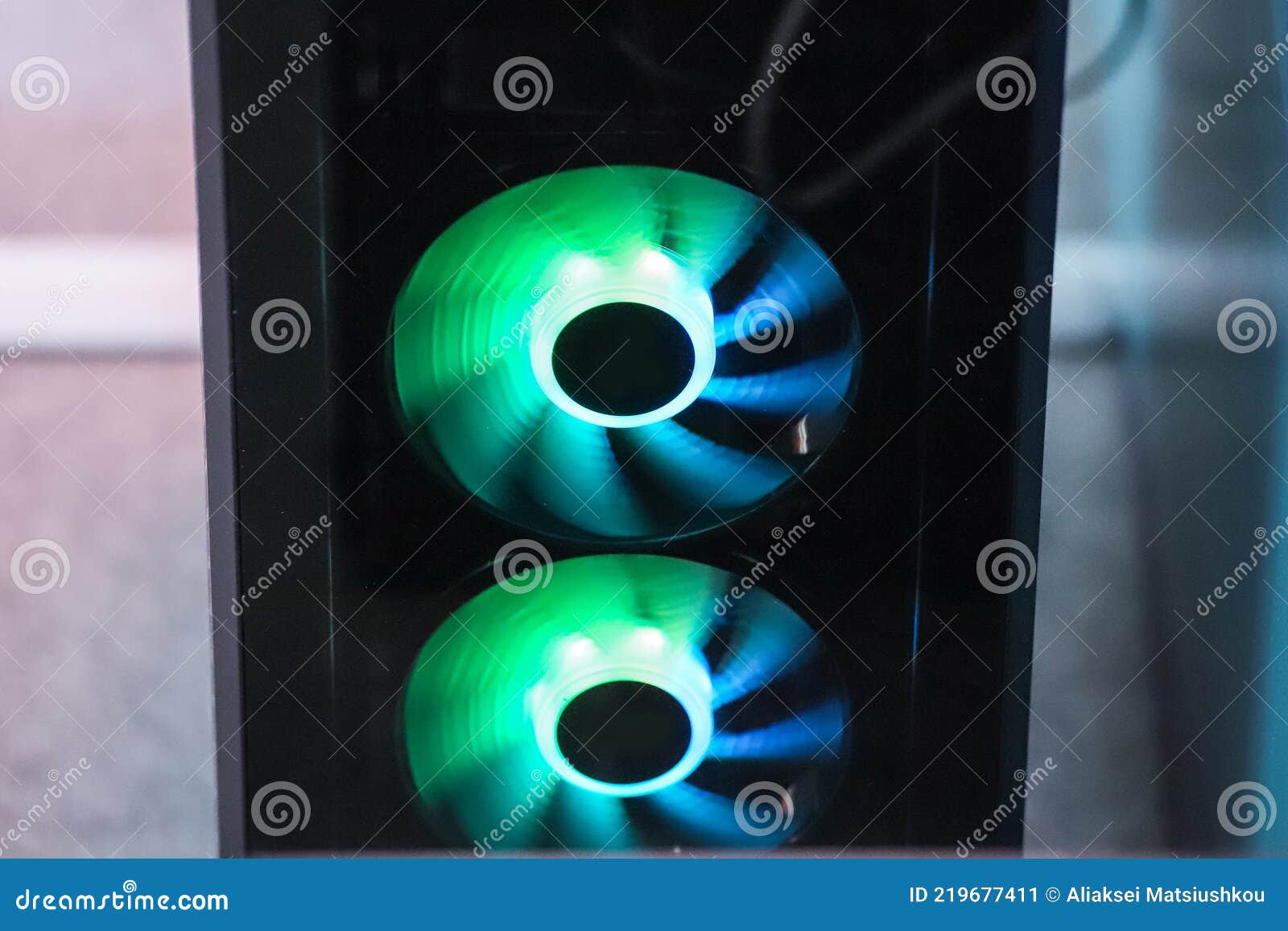 Green, Green and Yellow Illumination of the Cooler. Computer Fan with