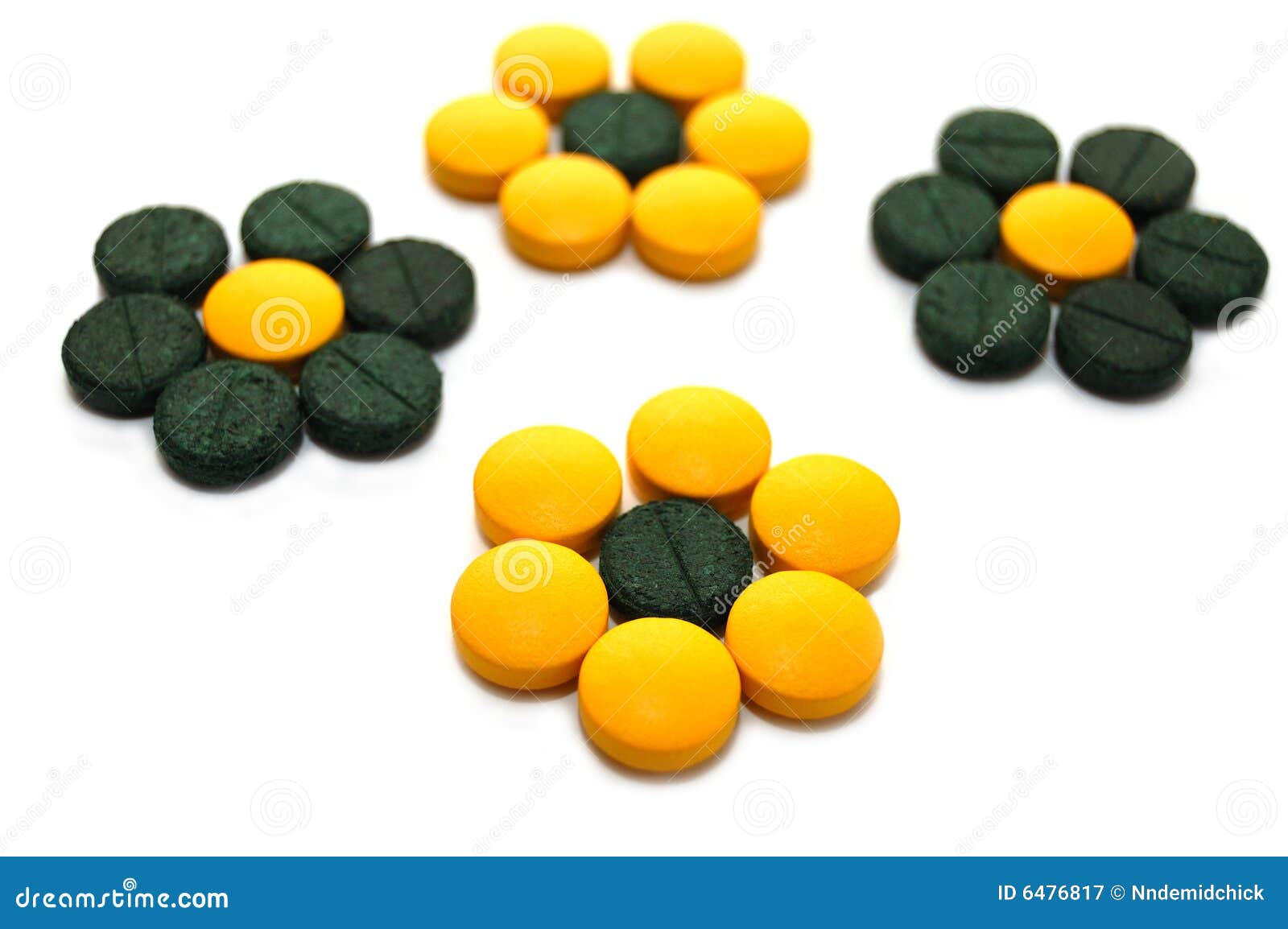 Green and Yellow Pills in the Form of Flowers Stock Image Image of
