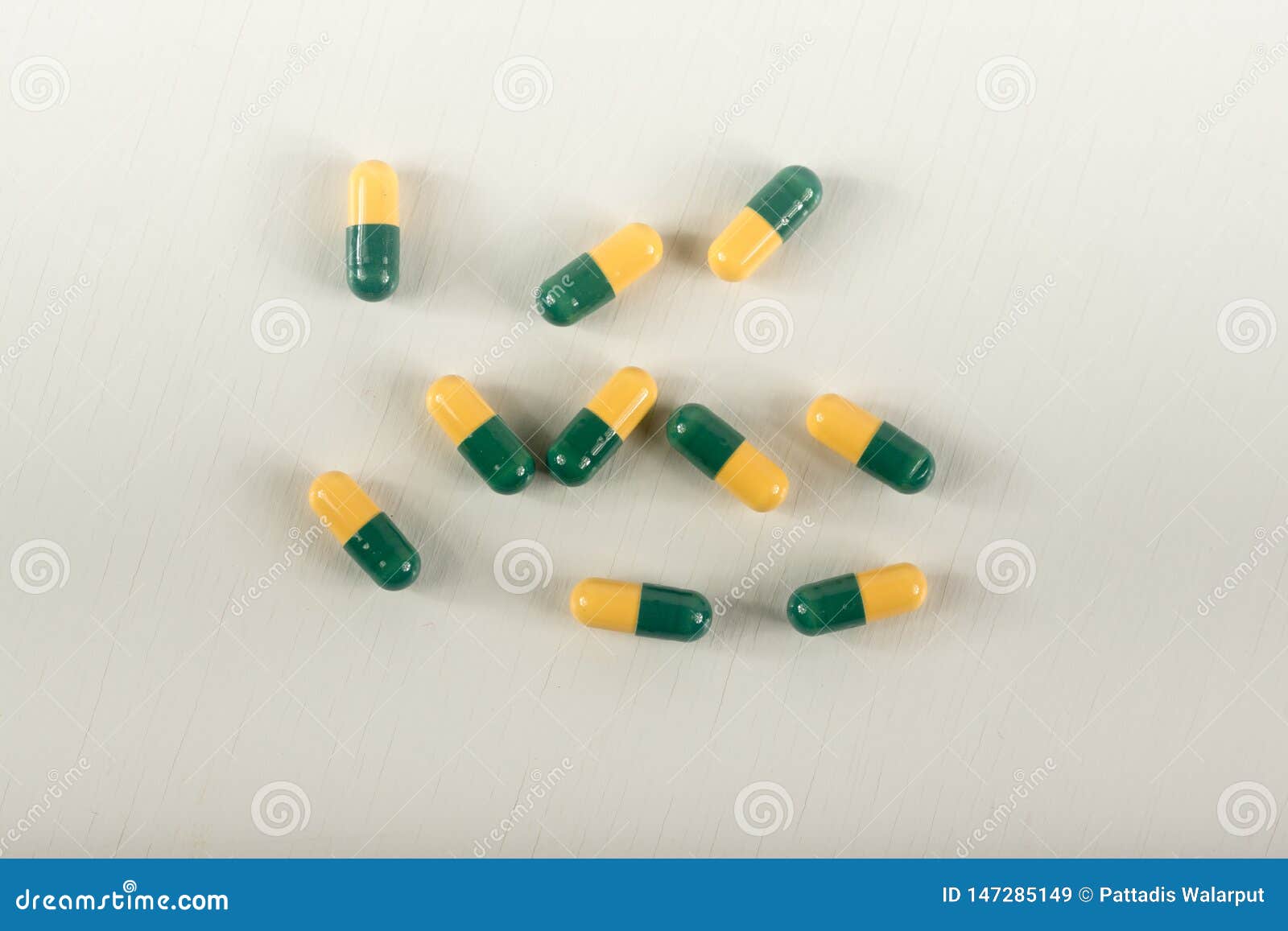 Download 7 071 Green Yellow Capsule Photos Free Royalty Free Stock Photos From Dreamstime Yellowimages Mockups