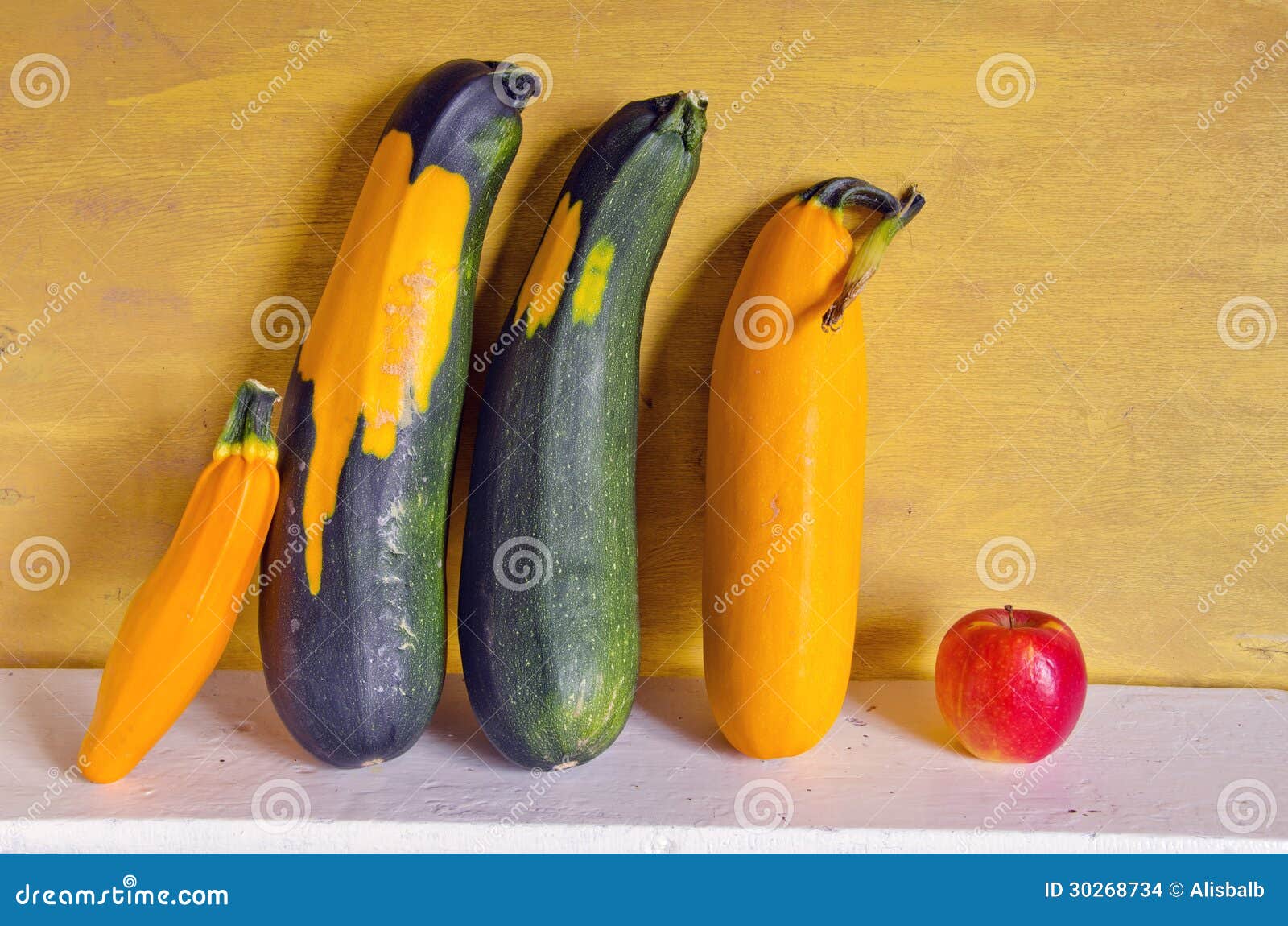 Green and Yellow Zucchini and Red Apple Stock Photo Image of zucchini