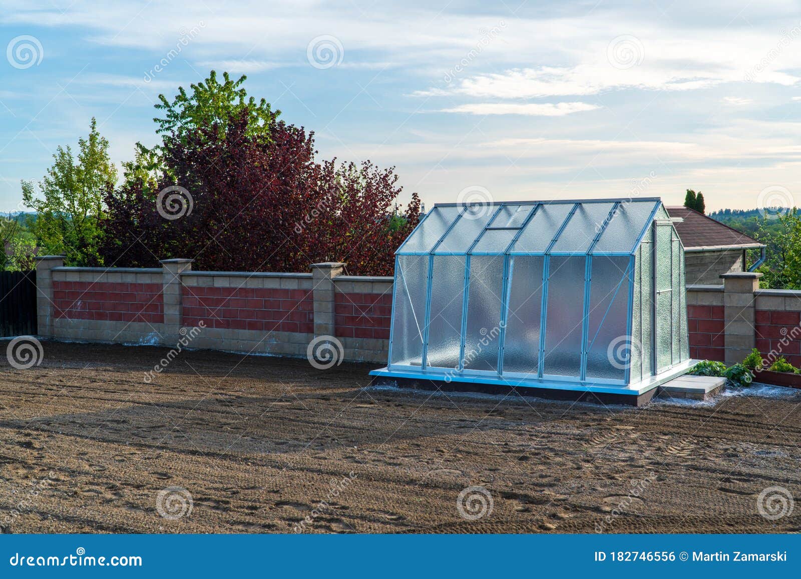 Greenhouse in the Garden with the Soil Around it Stock Photo Image of hothouse, industrial