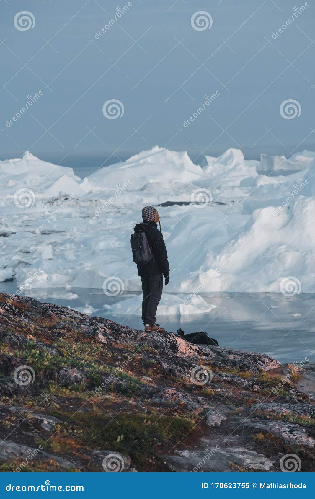 Greenland Tourist Man Explorer Overlooking Icefjord in Ilulissat. Travel in Arctic Landscape Nature with Icebergs Stock - Image greenland, 170623755