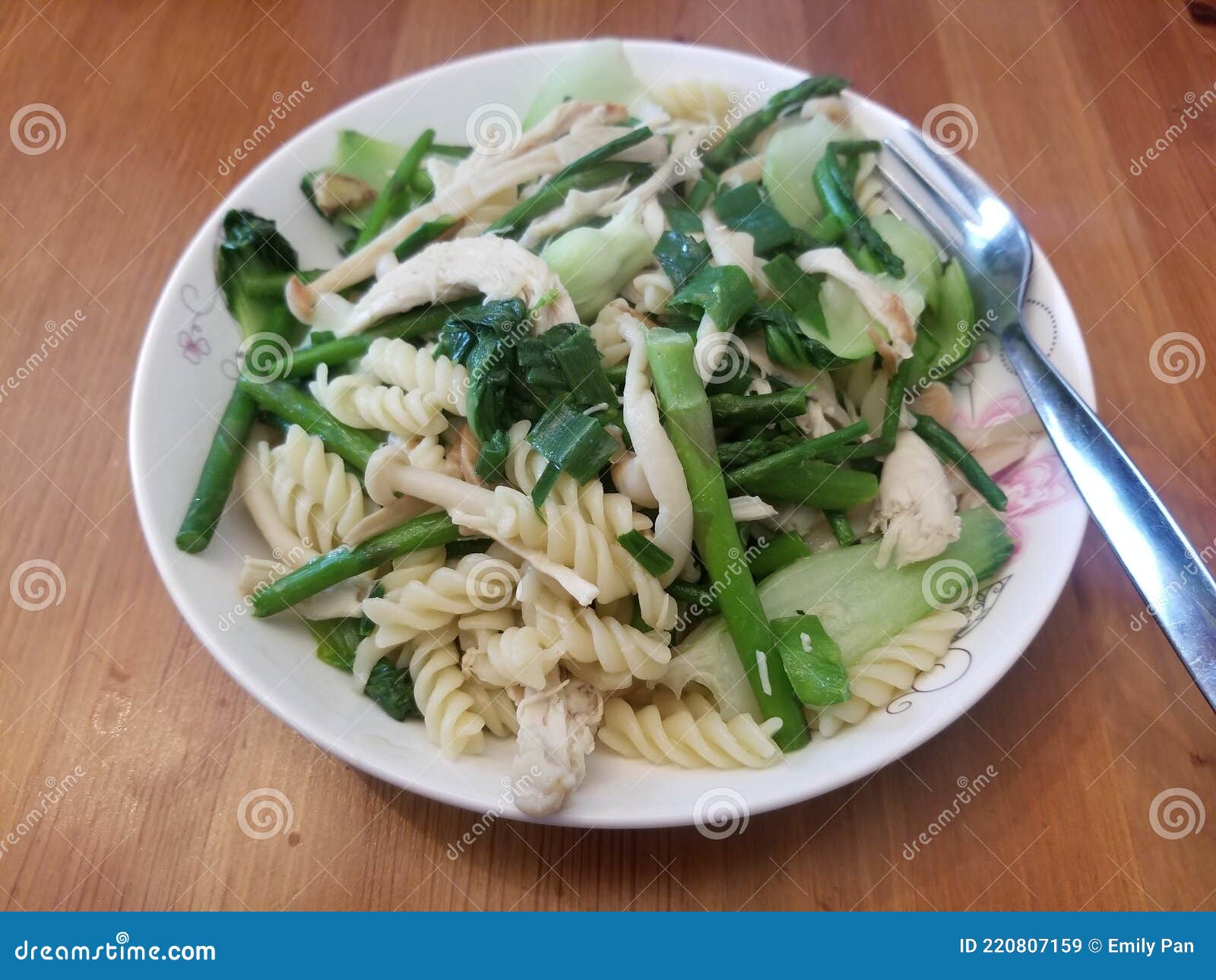 Greens Chicken and Pasta stock image. Image of curry 220807159