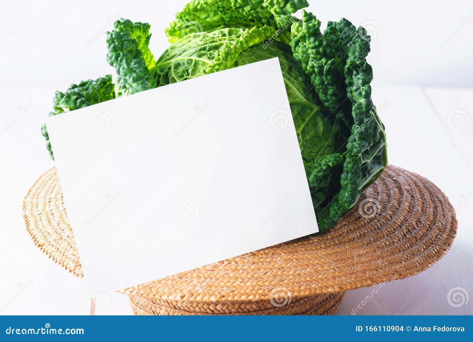 Download Mock Up Invitation Card Or Baby Card With Fresh Savoy Cabbage In A Straw Hat On White Wooden ...