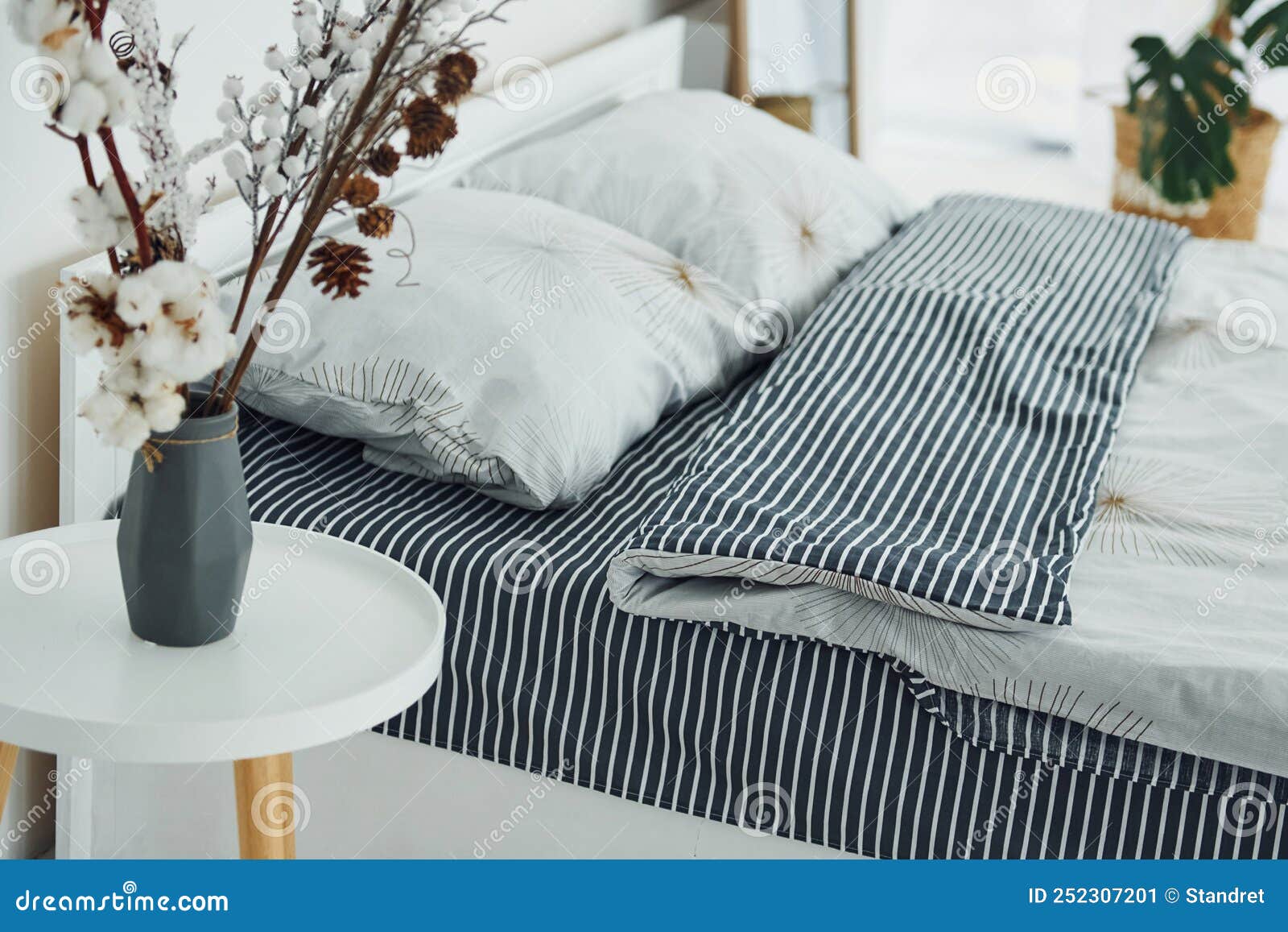 Grey Bed. Interior and Design of Beautiful Modern Bedroom at Daytime