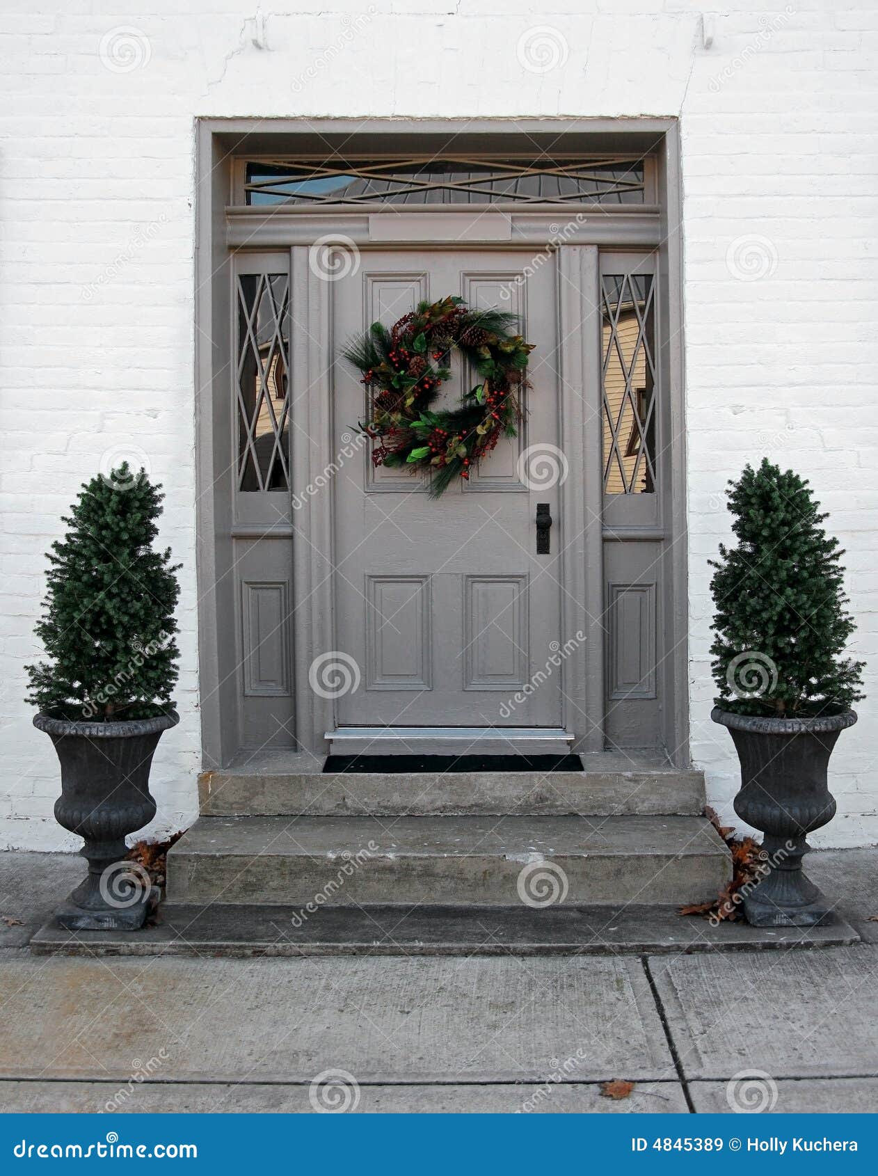 Grey Doorway with Wreath stock image. Image of door, building 4845389