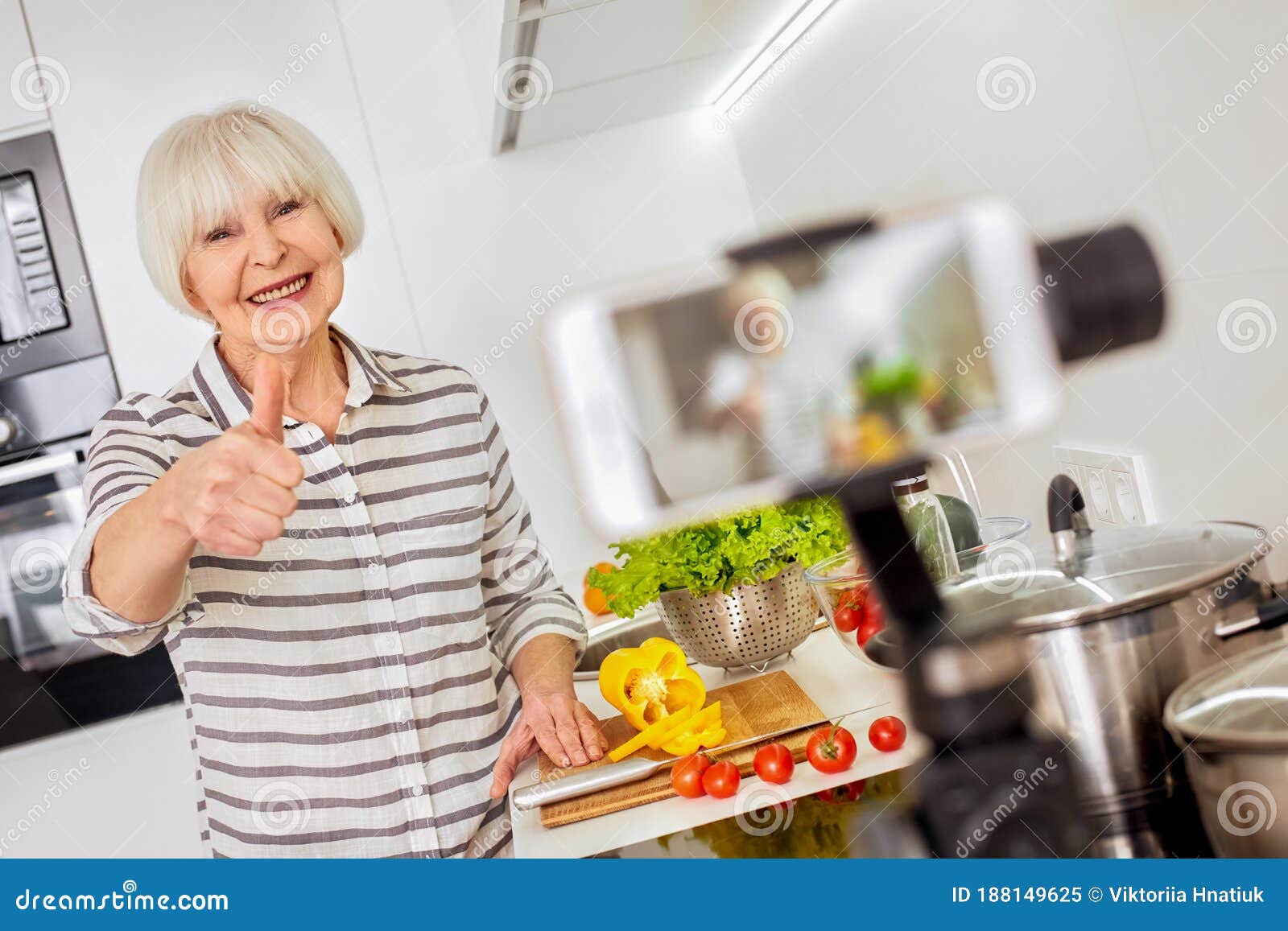 Grey Hair Woman Using Modern Smartphone, Cooking Food, Recording Video  Stock Image - Image of broadcast, happy: 188149625