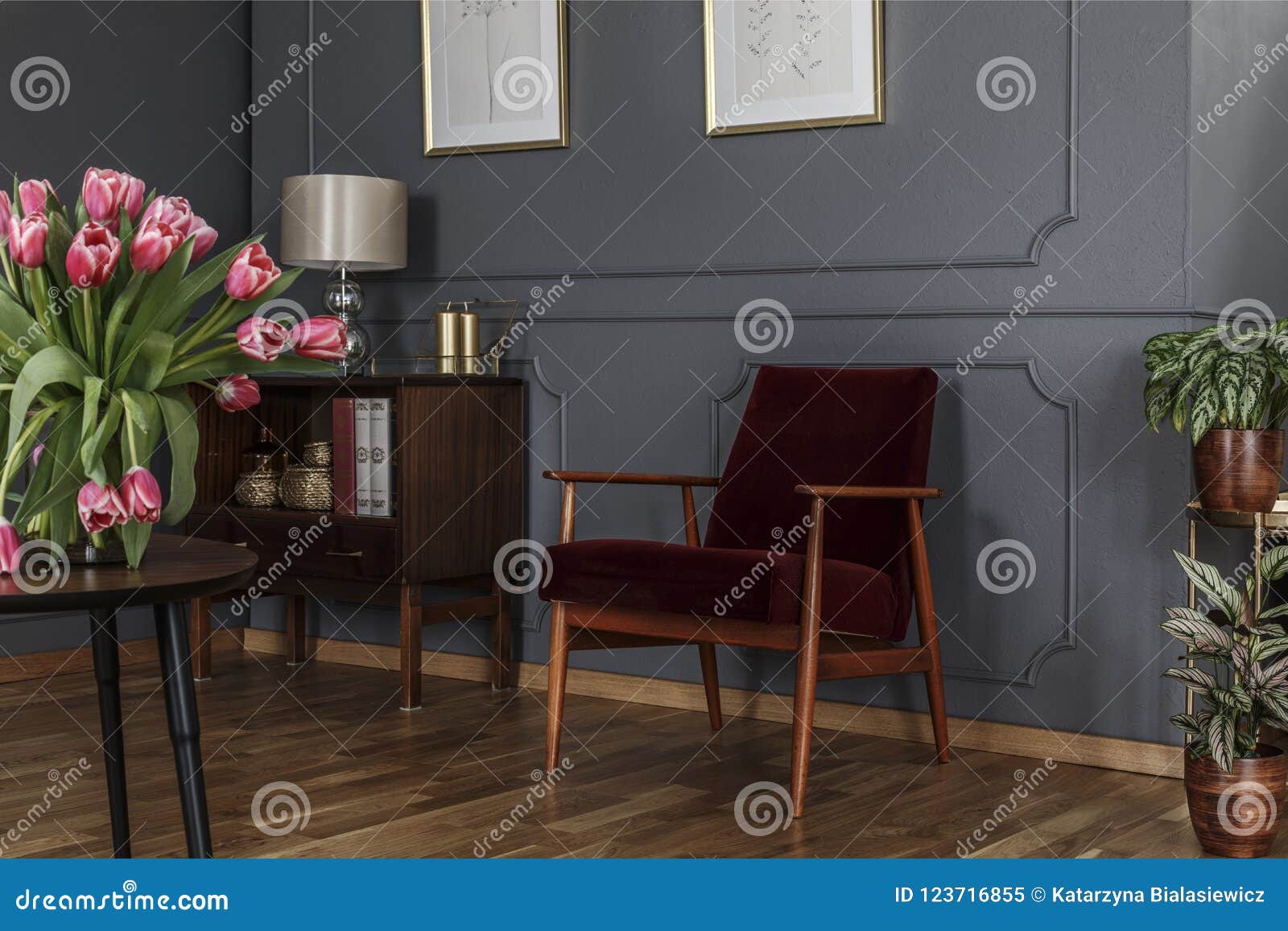grey living room interior with wainscoting on the wall, wooden c
