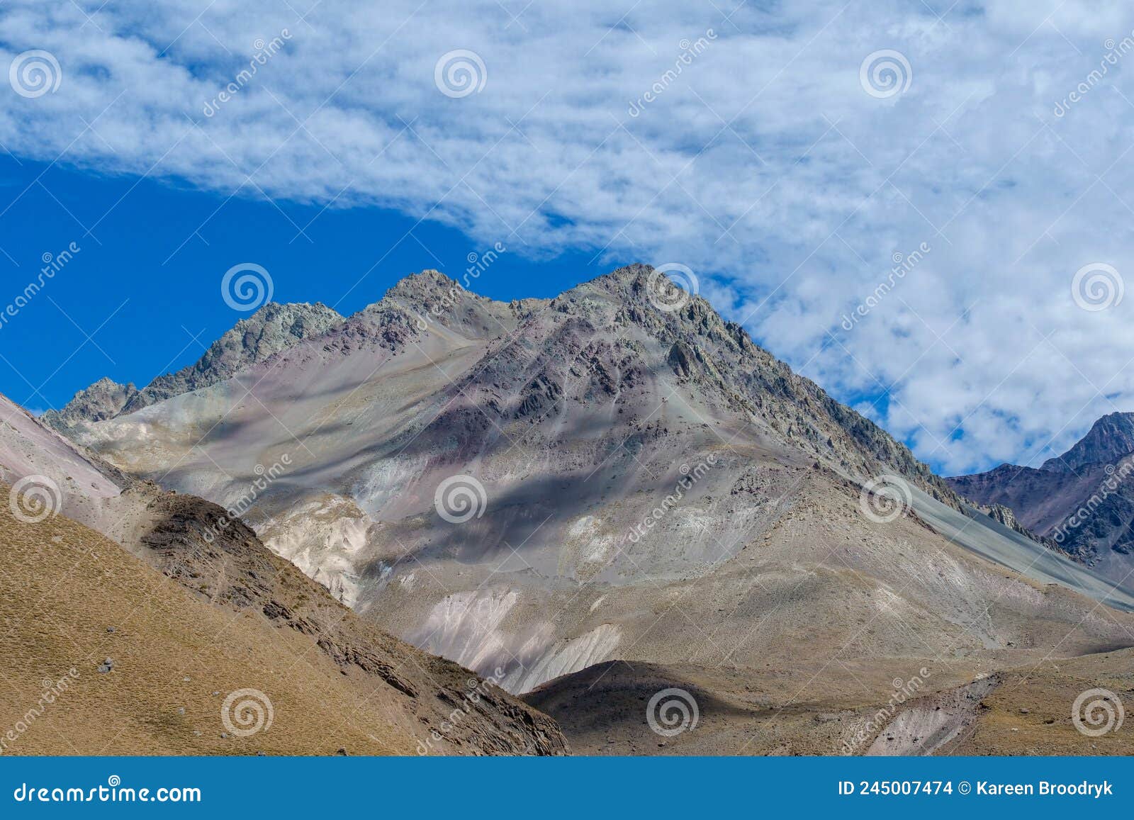 grey mountain peaks at valle de colina, cajÃÂ³n del maipo at san miguel in chile,  a popular tourist destination