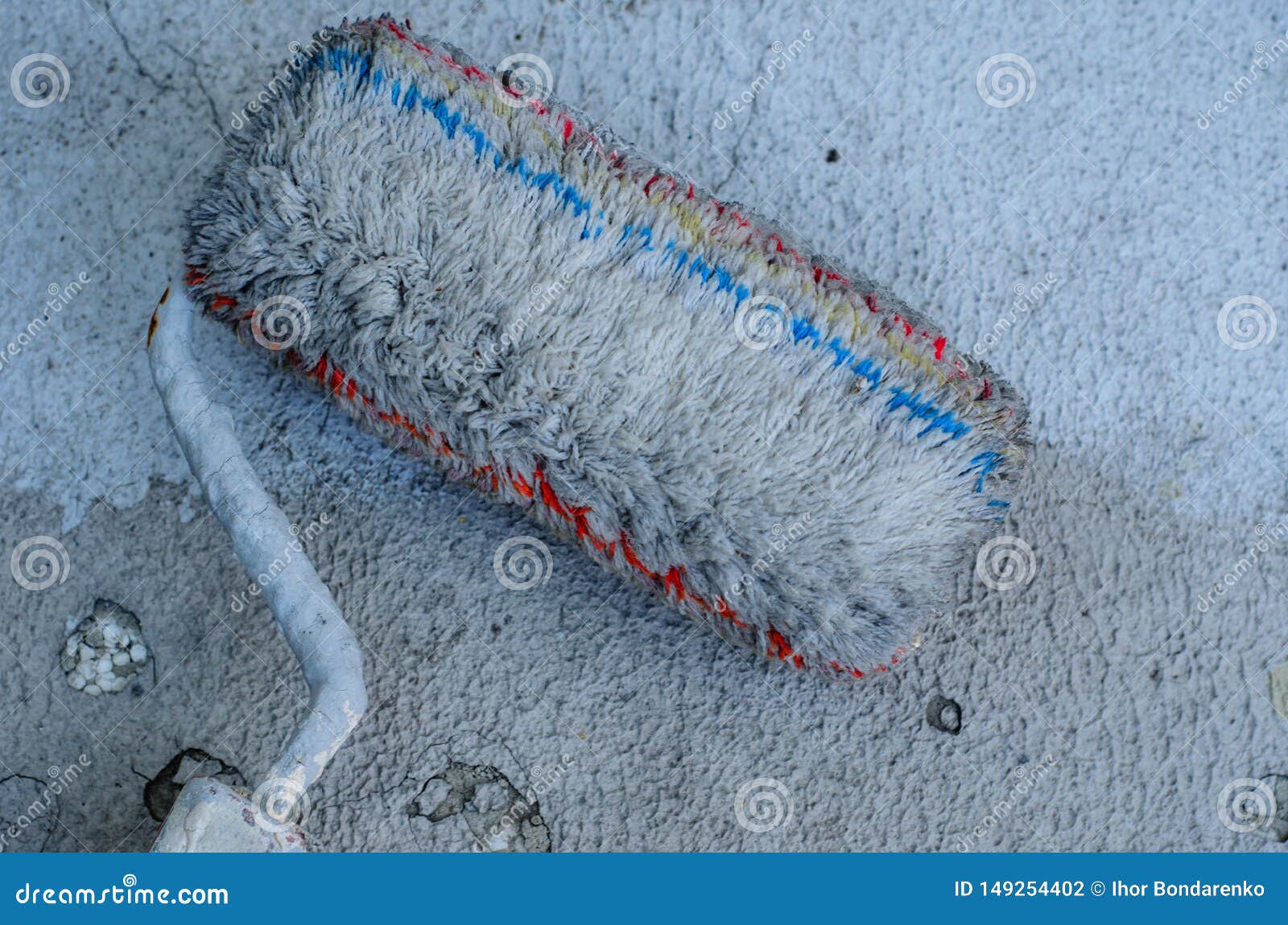 Grey Paint Roller on a Cracked Decorative Stucco Stock Photo Image of architecture, decoration