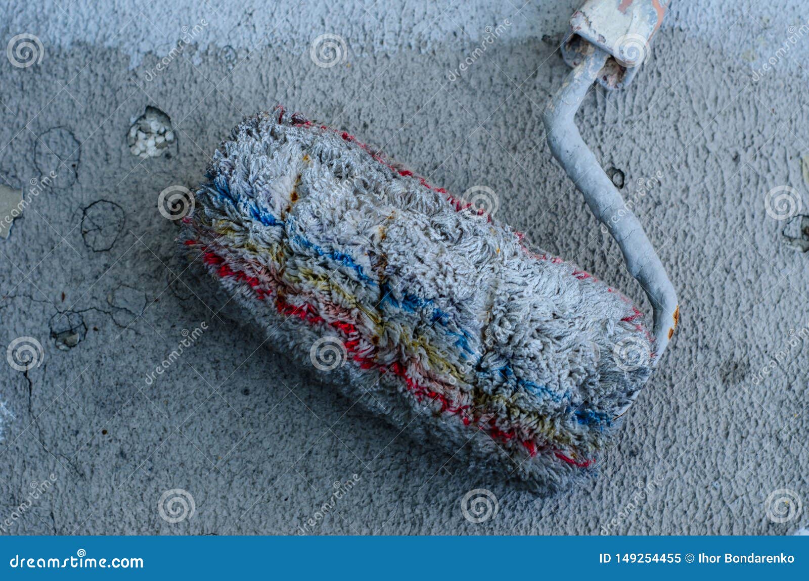 Grey Paint Roller on a Cracked Decorative Stucco Stock Image Image of bright, plaster 149254455