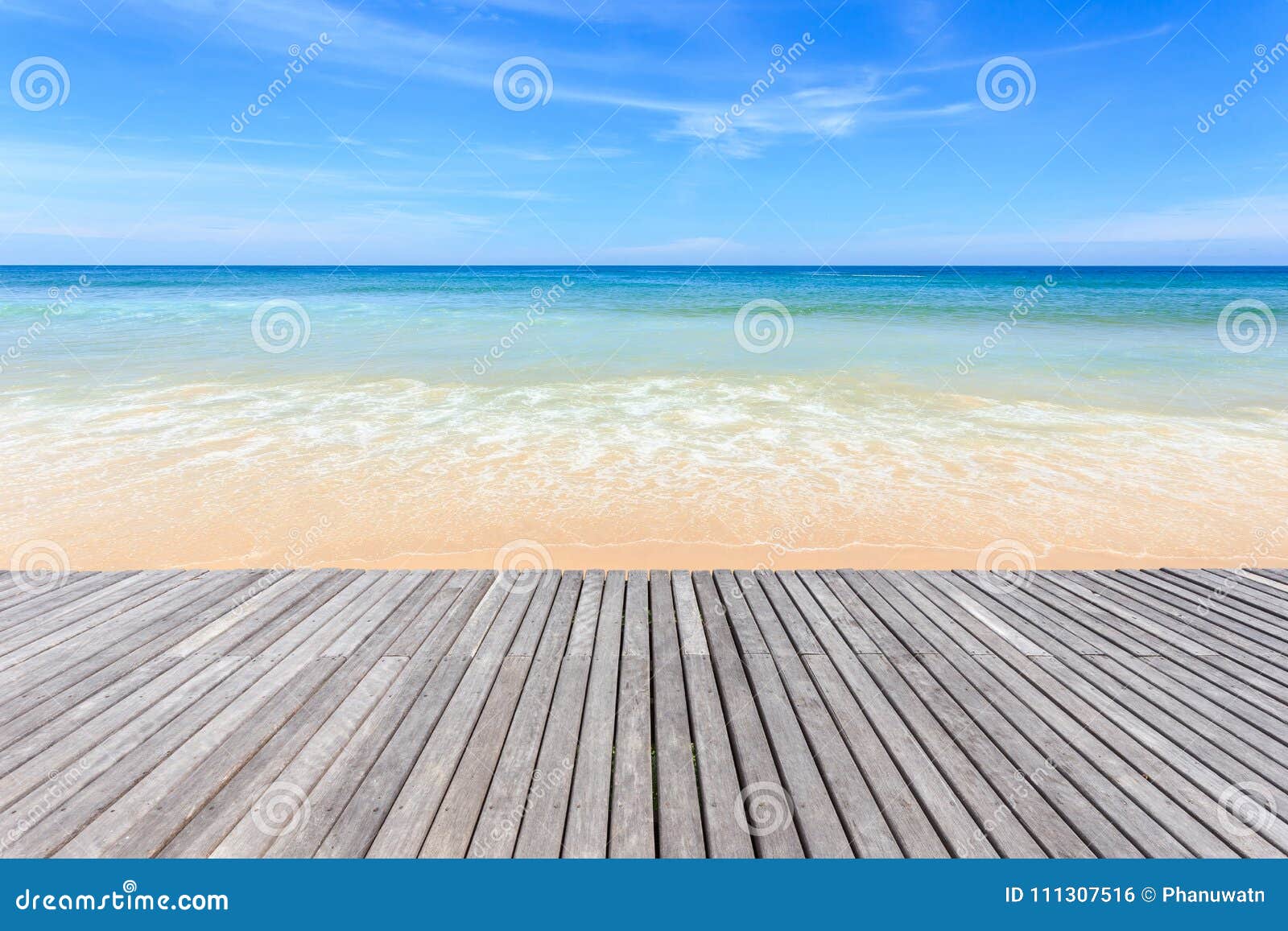 Wooden Decking and View of Tropical Beach Background Stock Photo
