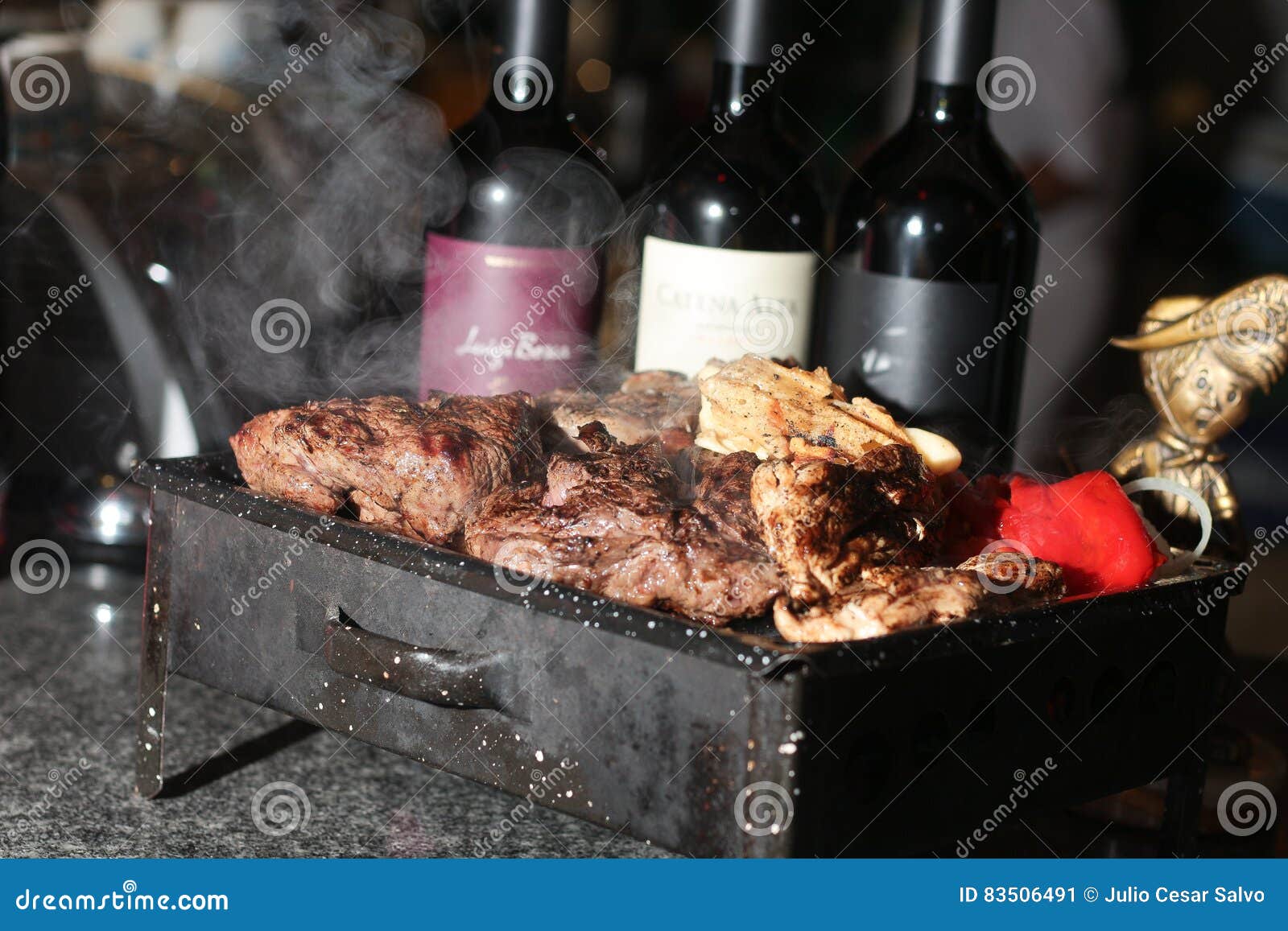 grill and bottle of wine