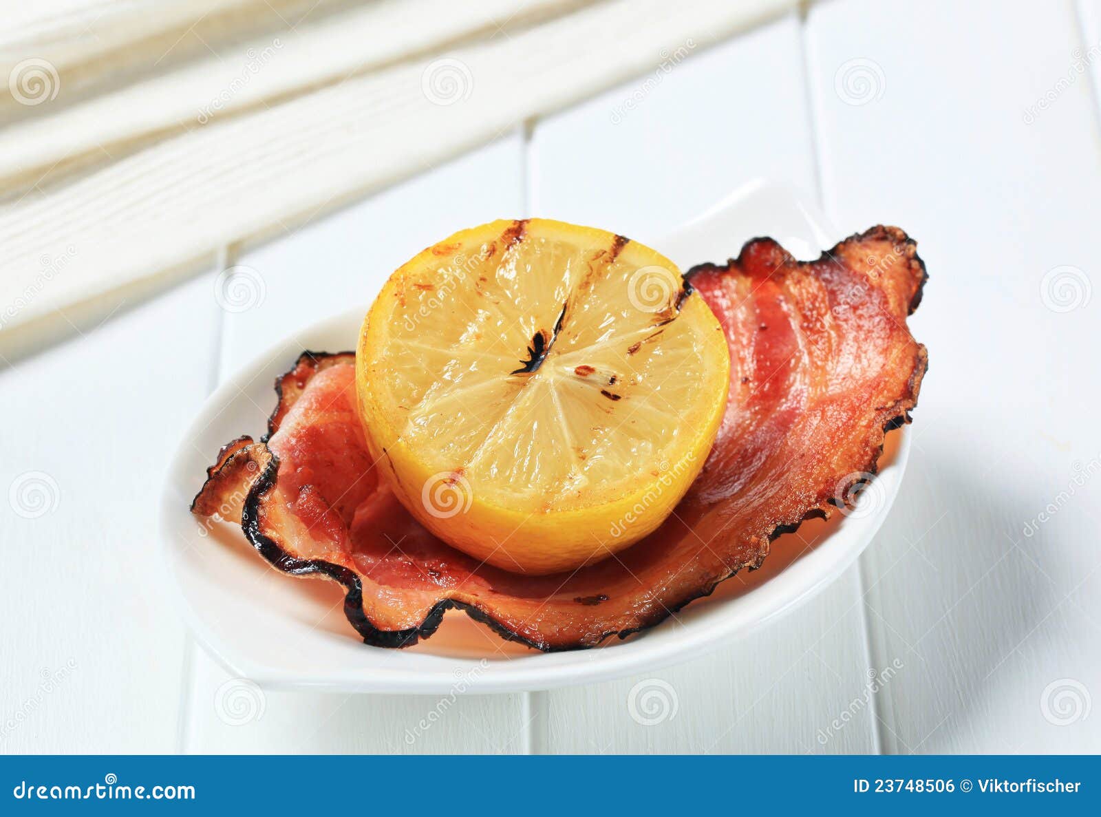Grilled bacon and lemon stock photo. Image of bowl, snack 23748506