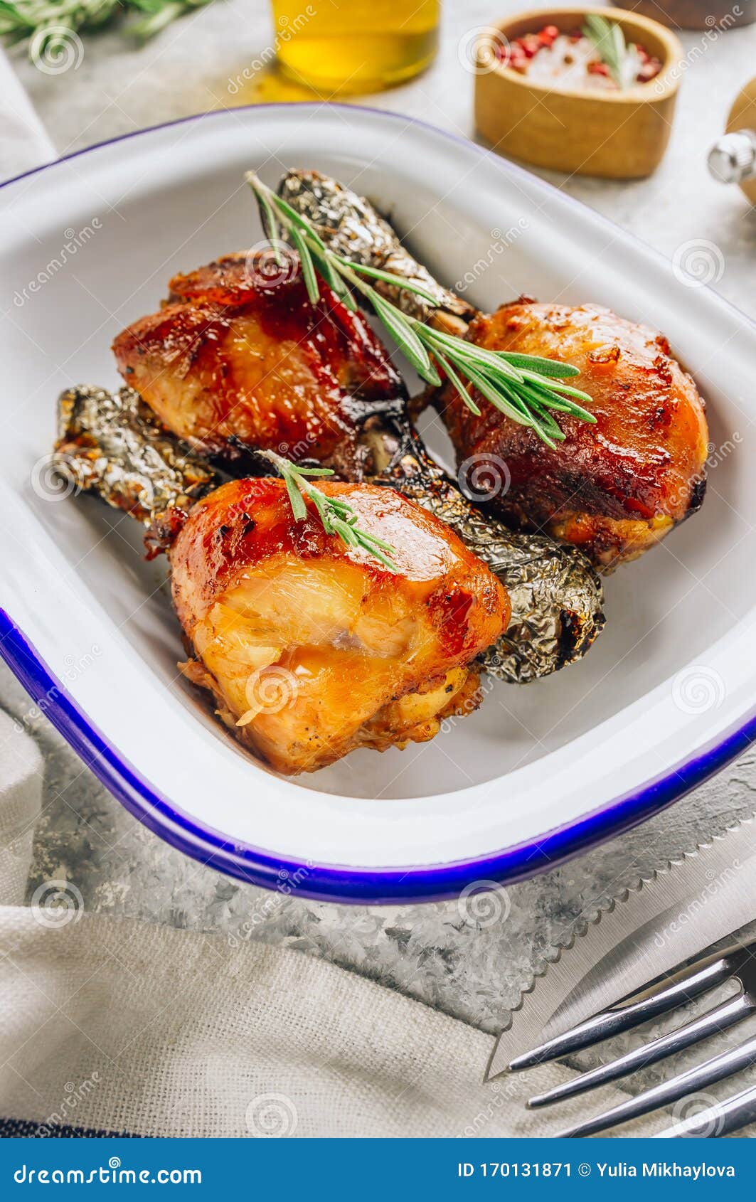 Grilled Chicken Drumstick Bbq with Rosemary on a Stone Gray Background